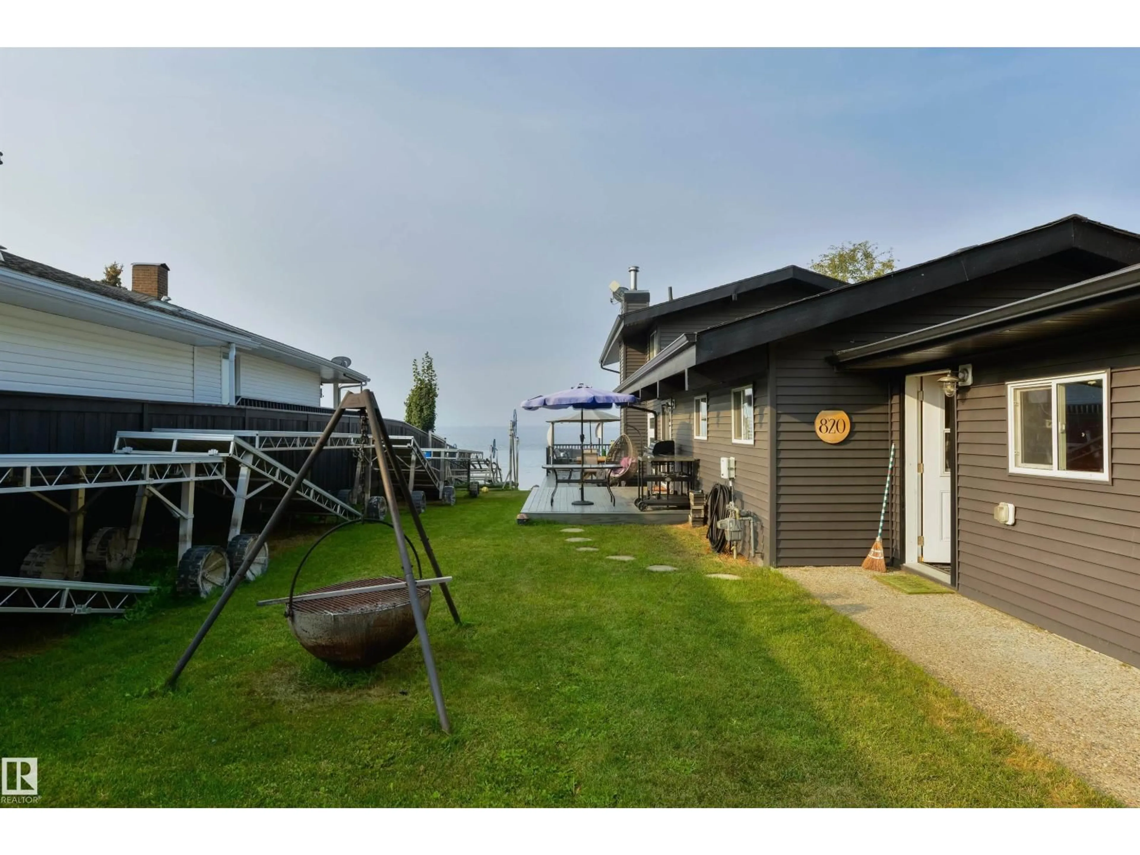 Patio, water/lake/river/ocean view for 820 8 ST, Rural Lac Ste. Anne County Alberta T0E1A0