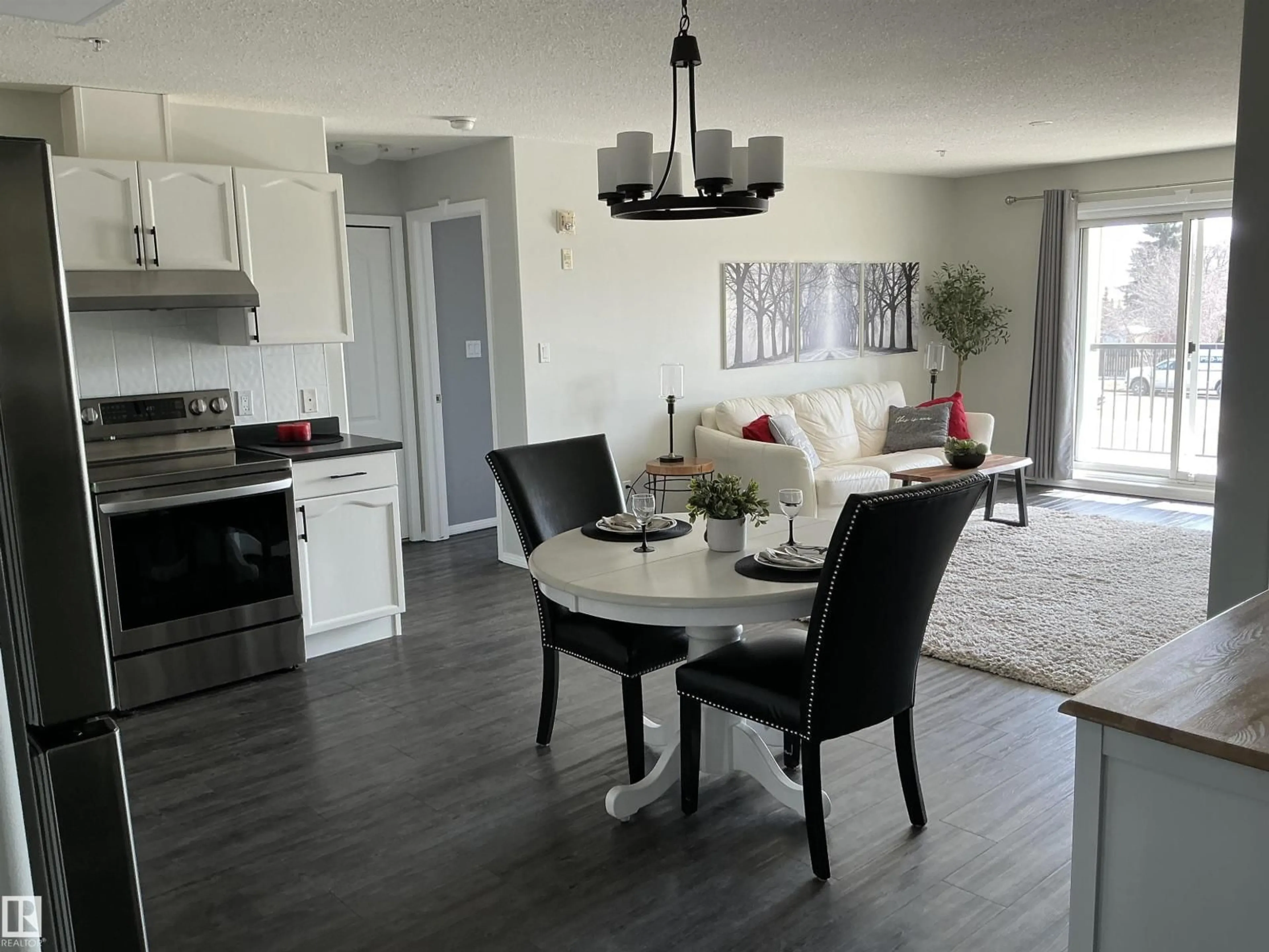 Open concept kitchen, unknown for #207 - 592 HOOKE RD, Edmonton Alberta T5A5H2