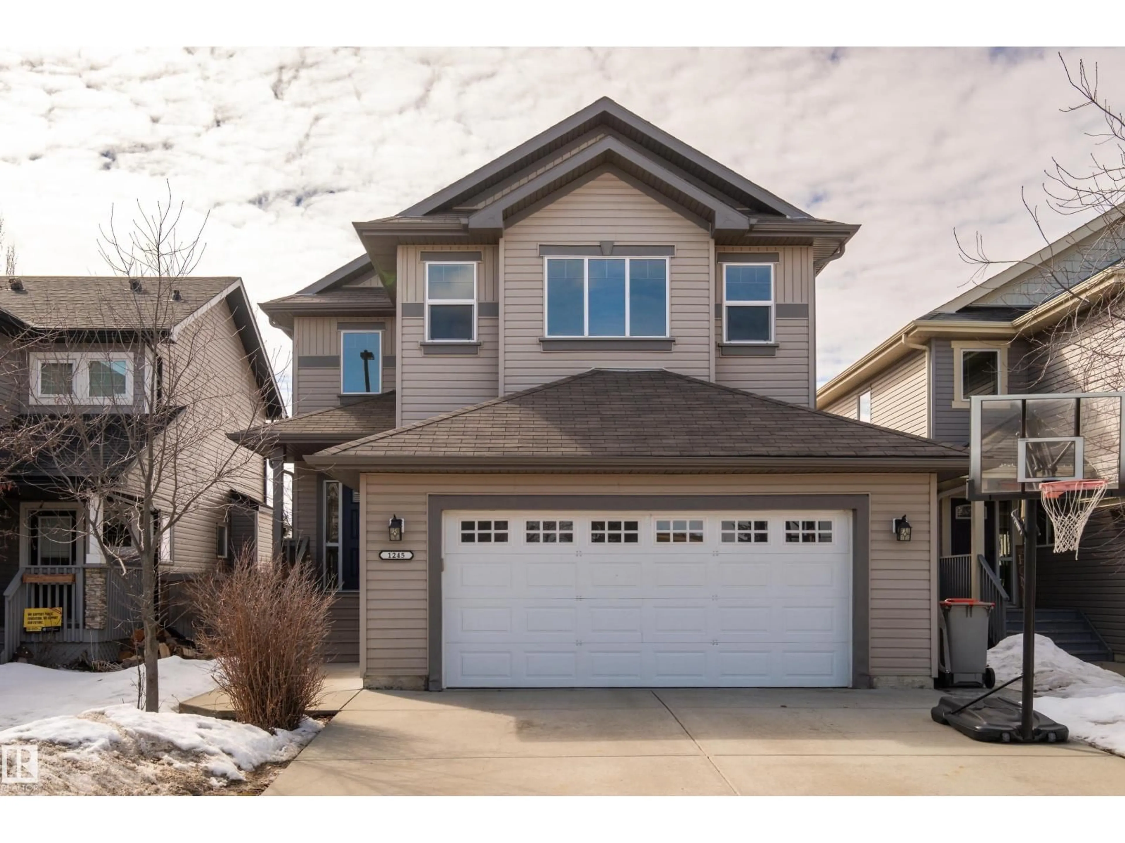 Home with vinyl exterior material, street for 1245 WESTERRA CR, Stony Plain Alberta T7Z0B2