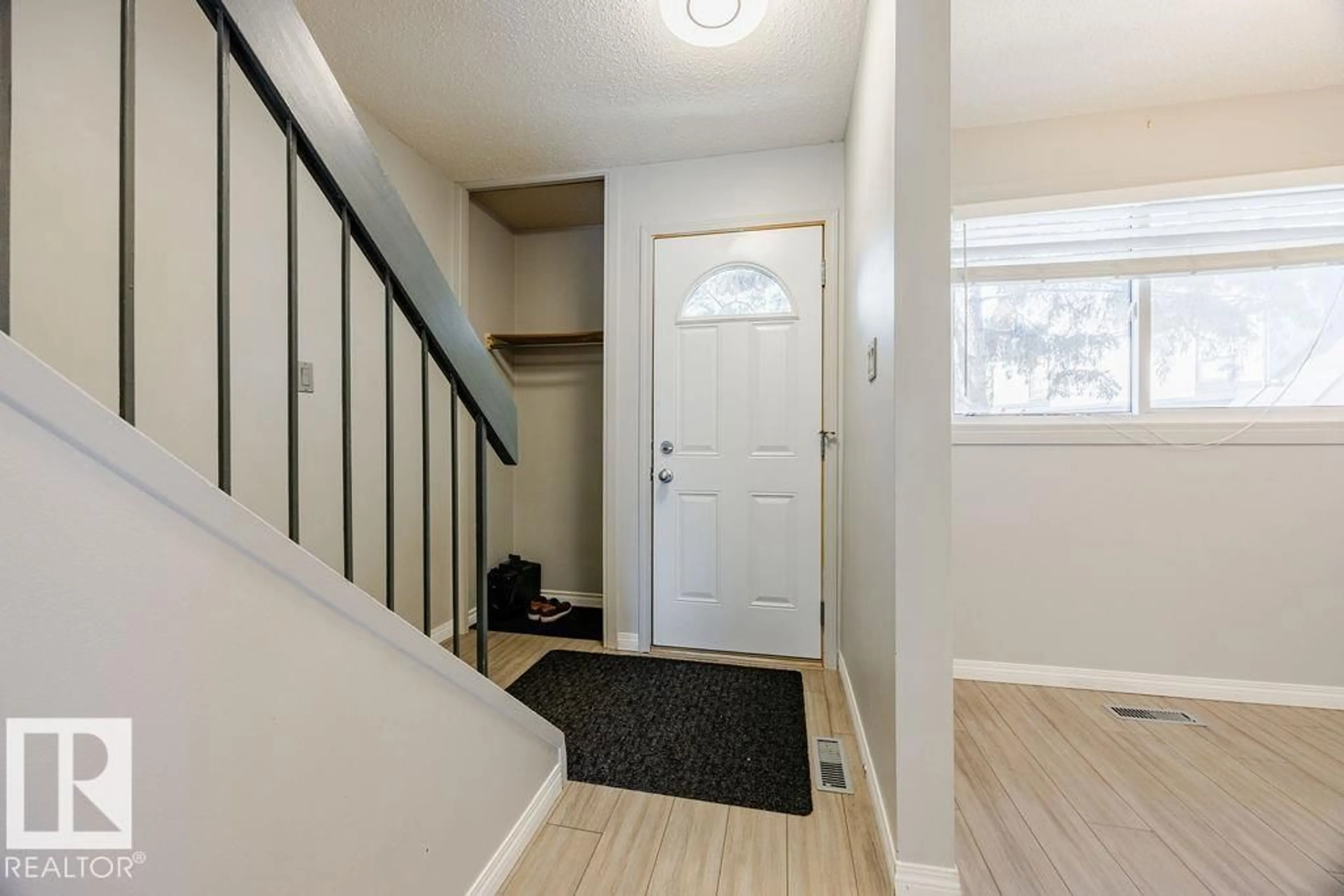 Indoor entryway for 12032 25 AV, Edmonton Alberta T6J4L3
