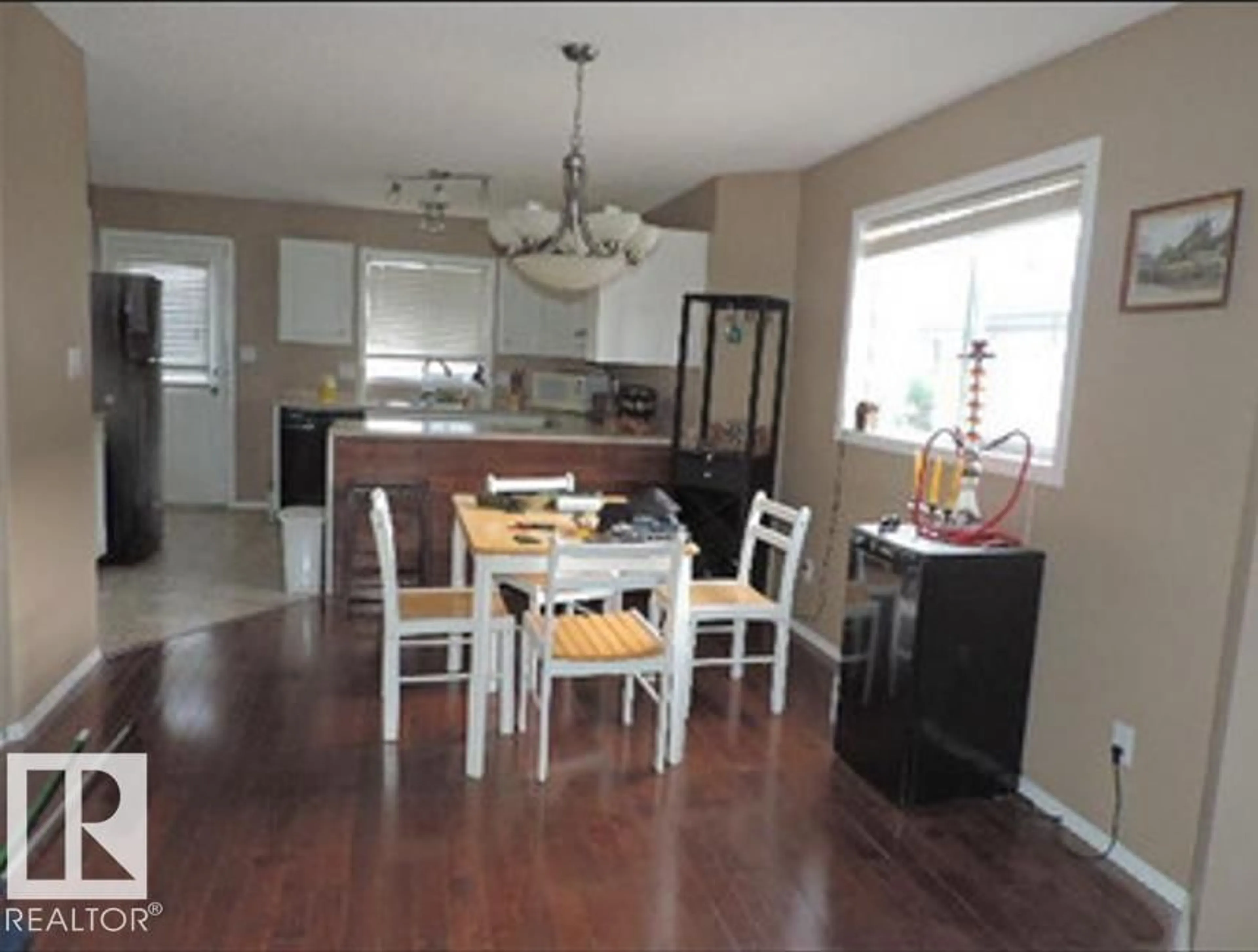 Open concept kitchen, wood/laminate floor for 1318 8 AV, Cold Lake Alberta T9M1N6