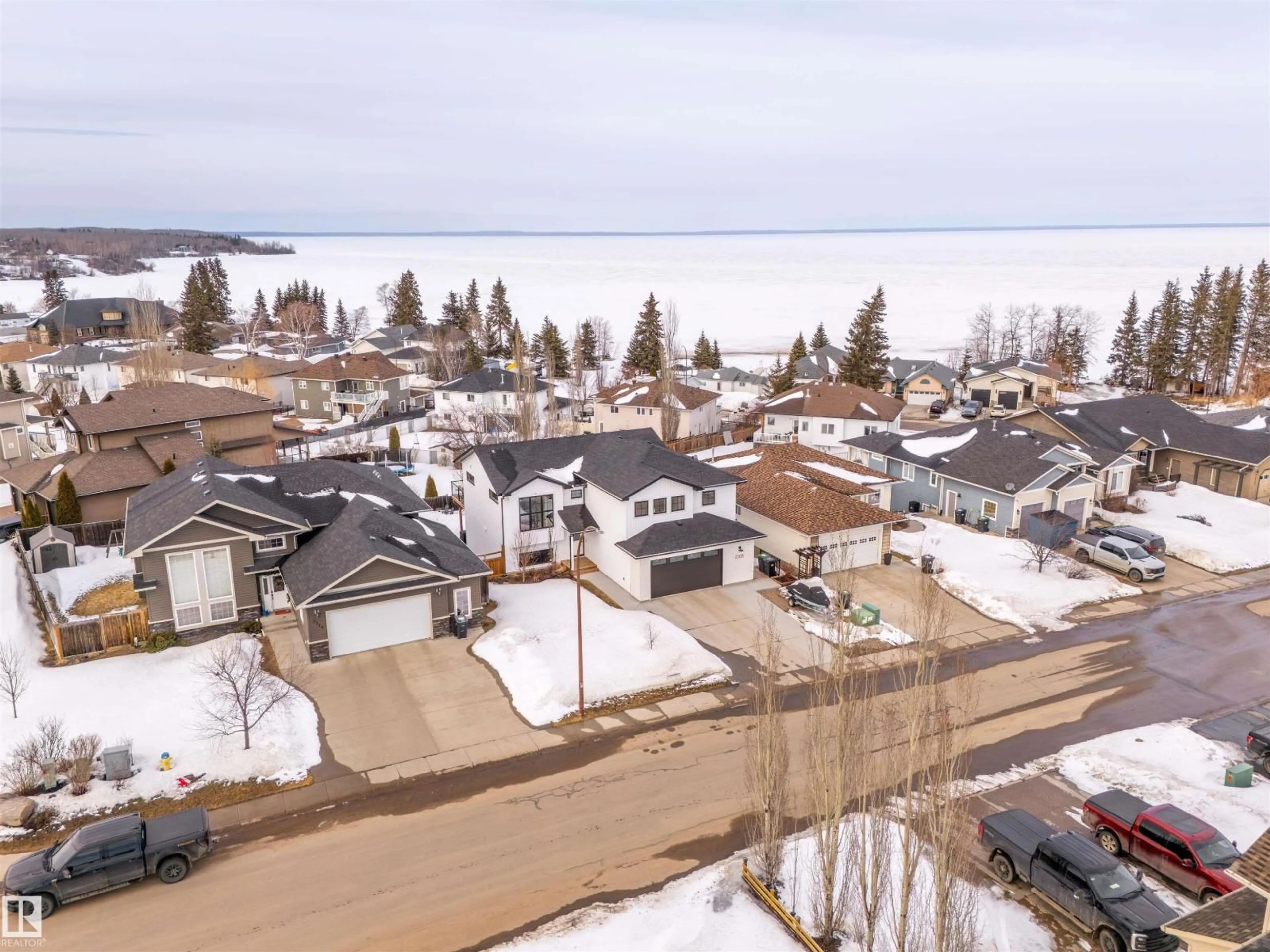 A pic from outside/outdoor area/front of a property/back of a property/a pic from drone, water/lake/river/ocean view for 2508 LAKE AV, Cold Lake Alberta T9M0A1