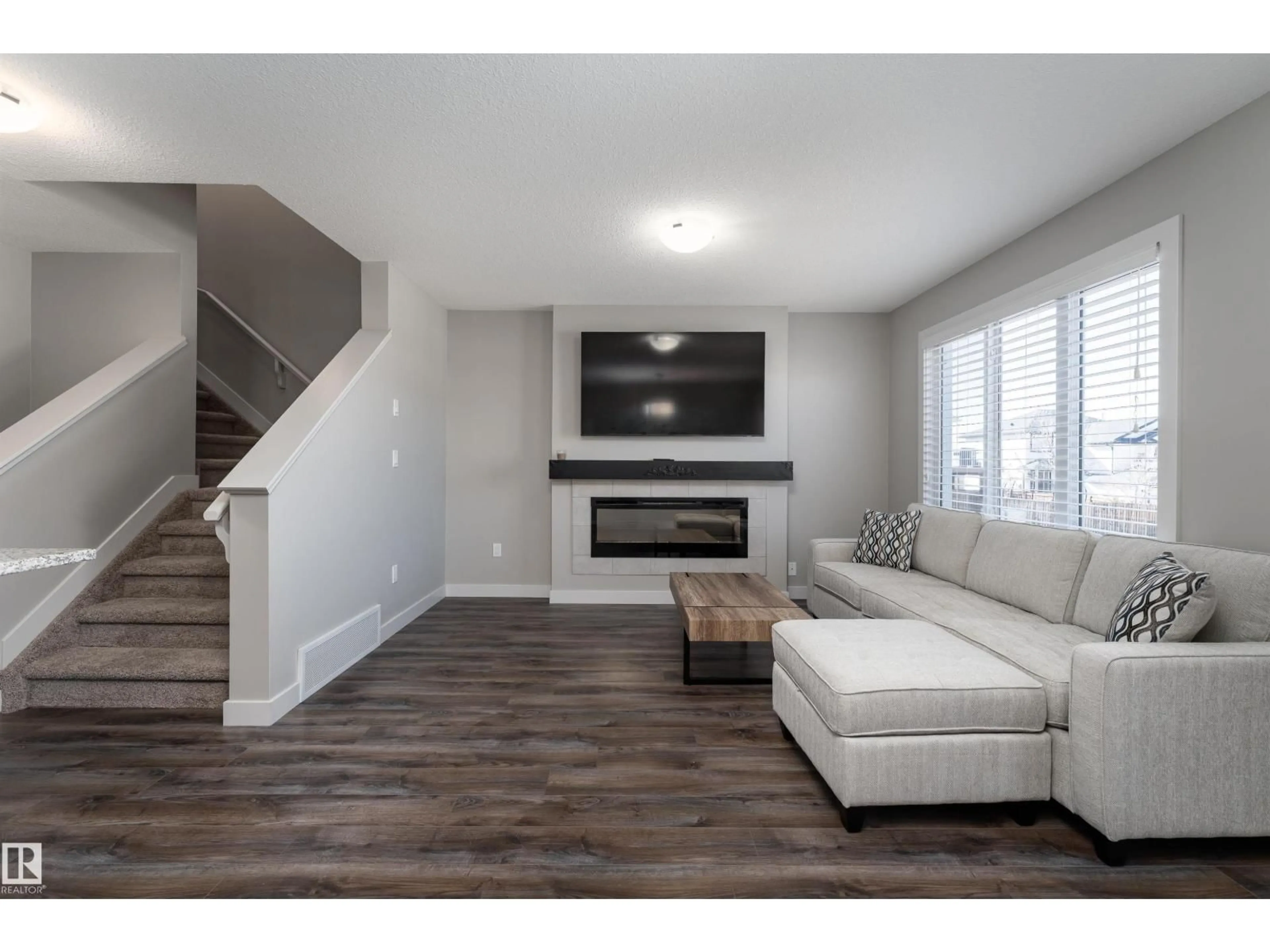 Living room with furniture, wood/laminate floor for 1 HAMMETT GA, Spruce Grove Alberta T7X0V2