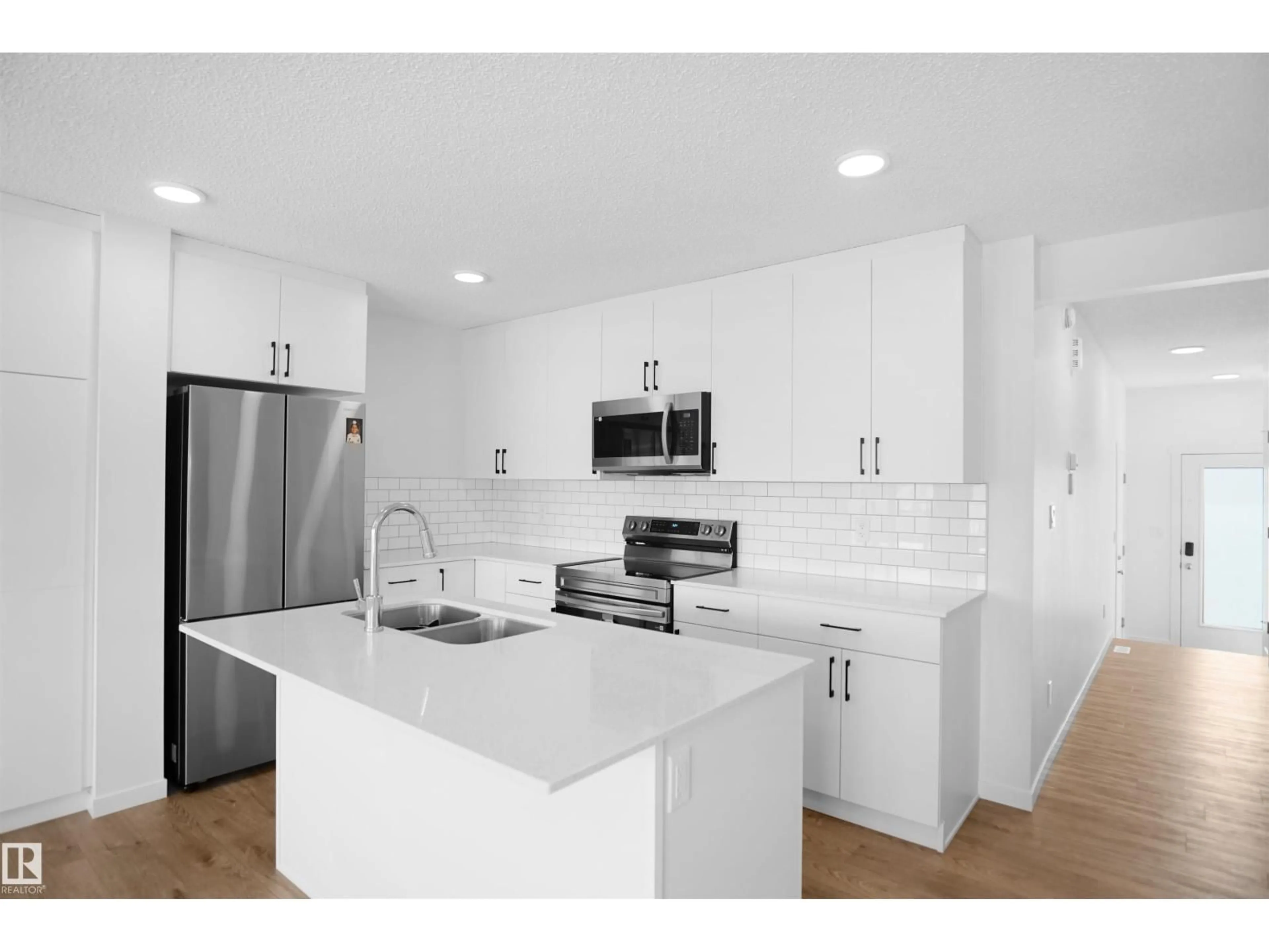 Open concept kitchen, unknown for #30 - 1430 ASTER WAY, Edmonton Alberta T6T2X5