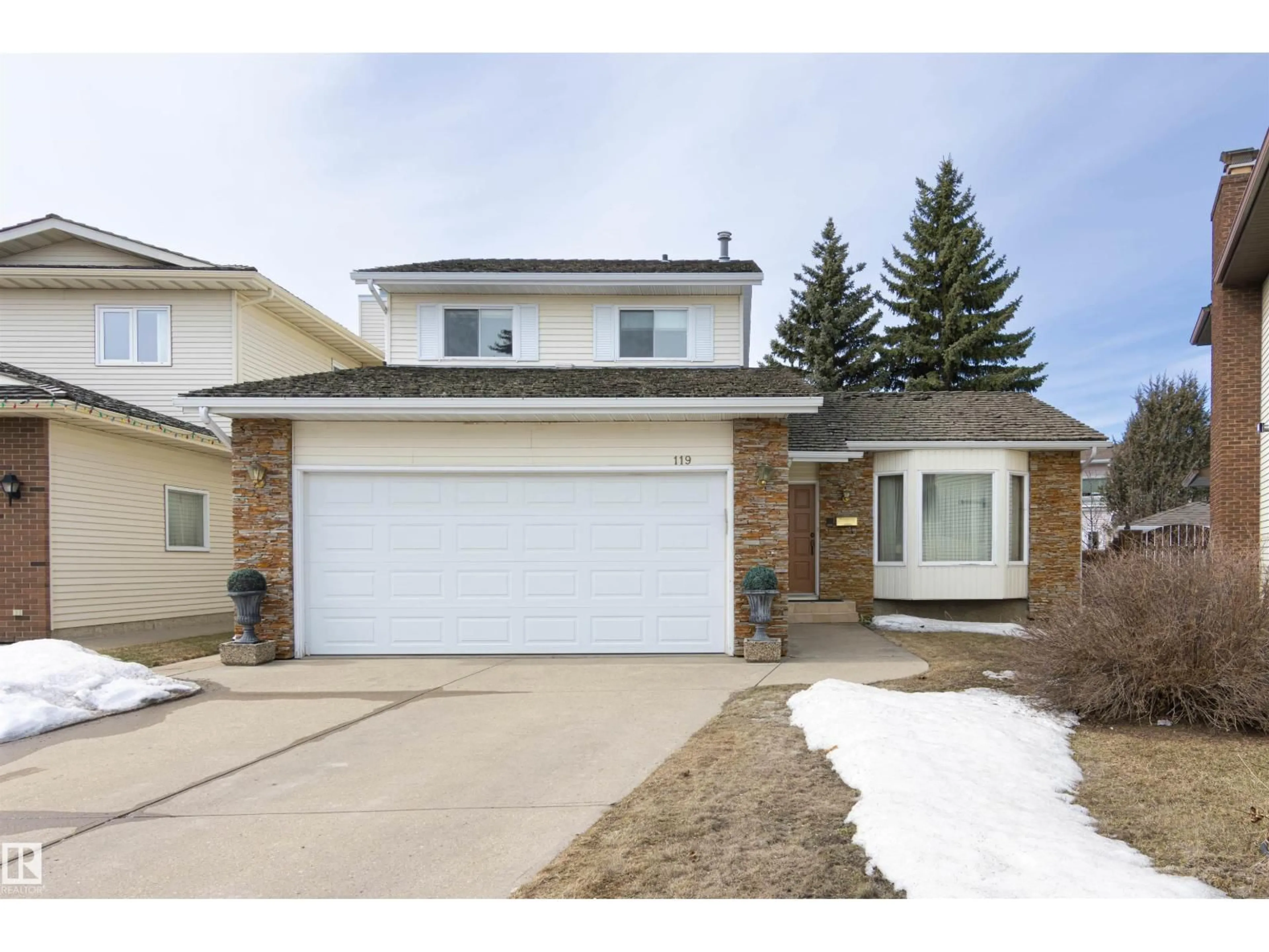 Home with vinyl exterior material, street for 119 CASTLE KEEP NW, Edmonton Alberta T5X5K6