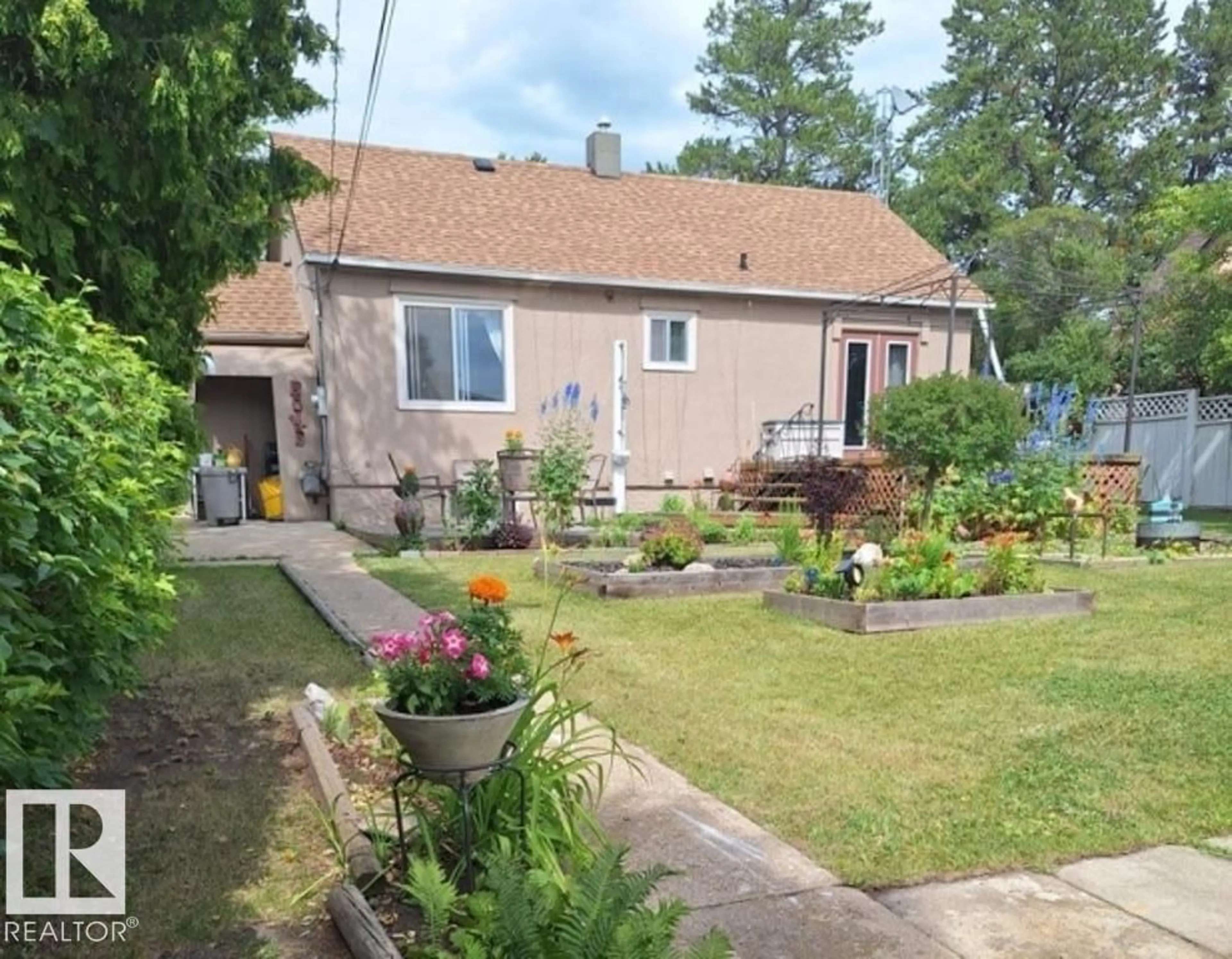 A pic from outside/outdoor area/front of a property/back of a property/a pic from drone, street for 4811 49 AV, Holden Alberta T0B2C0