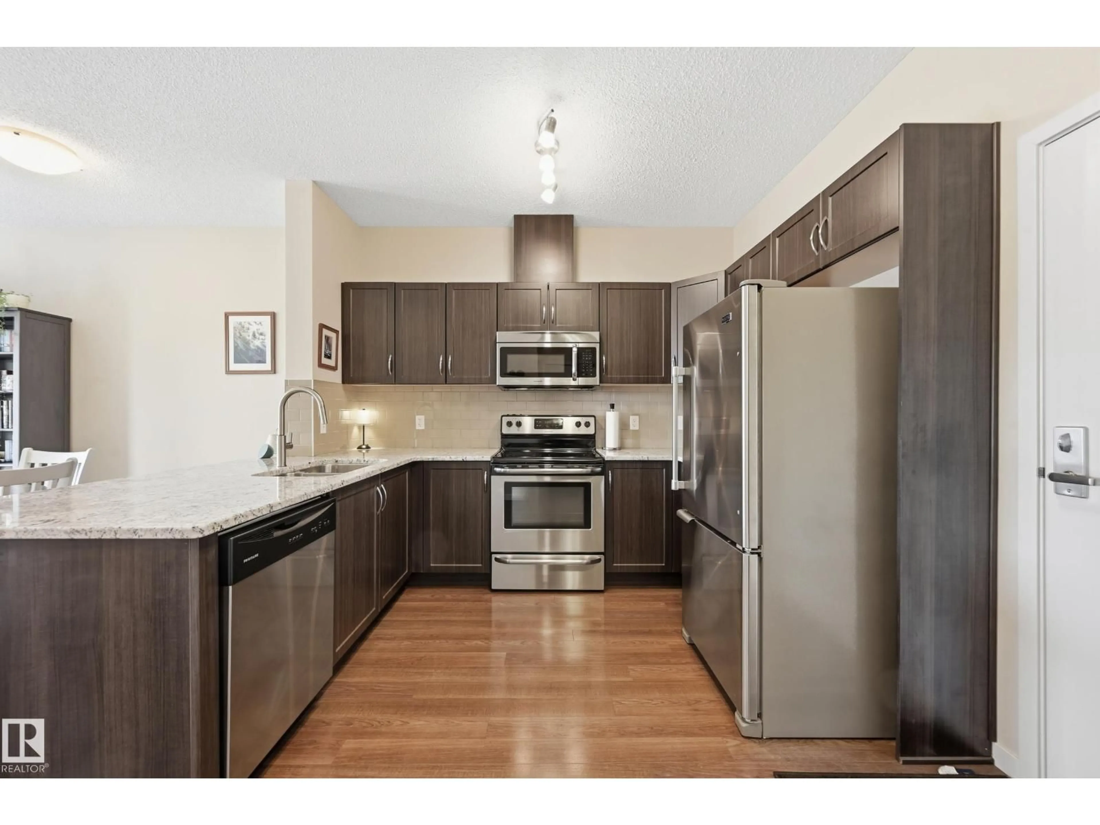 Standard kitchen, wood/laminate floor for #421 - 1820 RUTHERFORD RD, Edmonton Alberta T6W2K6