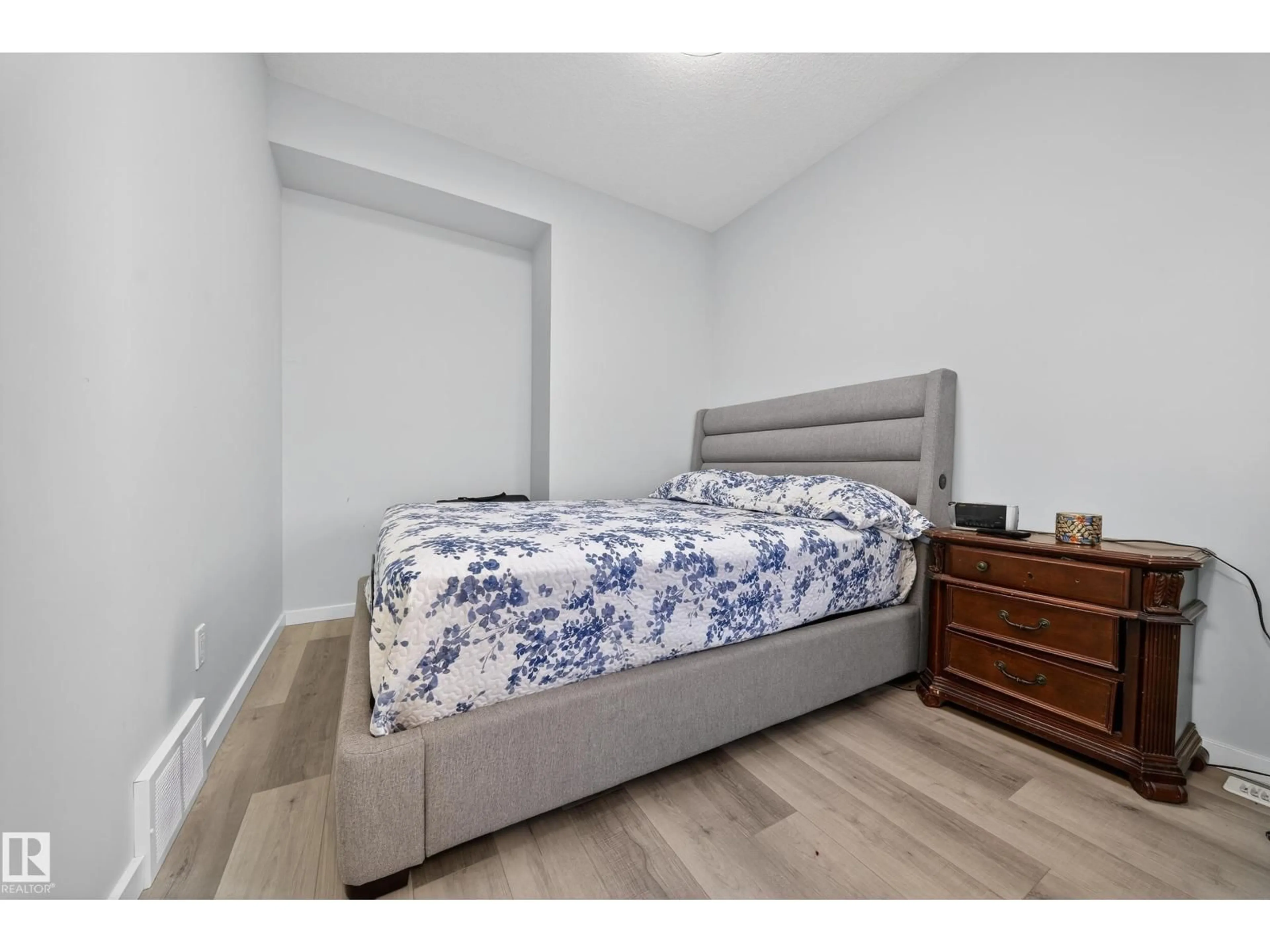 Bedroom with bed, wood/laminate floor for CI SW - 1575 PLUM CIRCLE, Edmonton Alberta T6X2W9