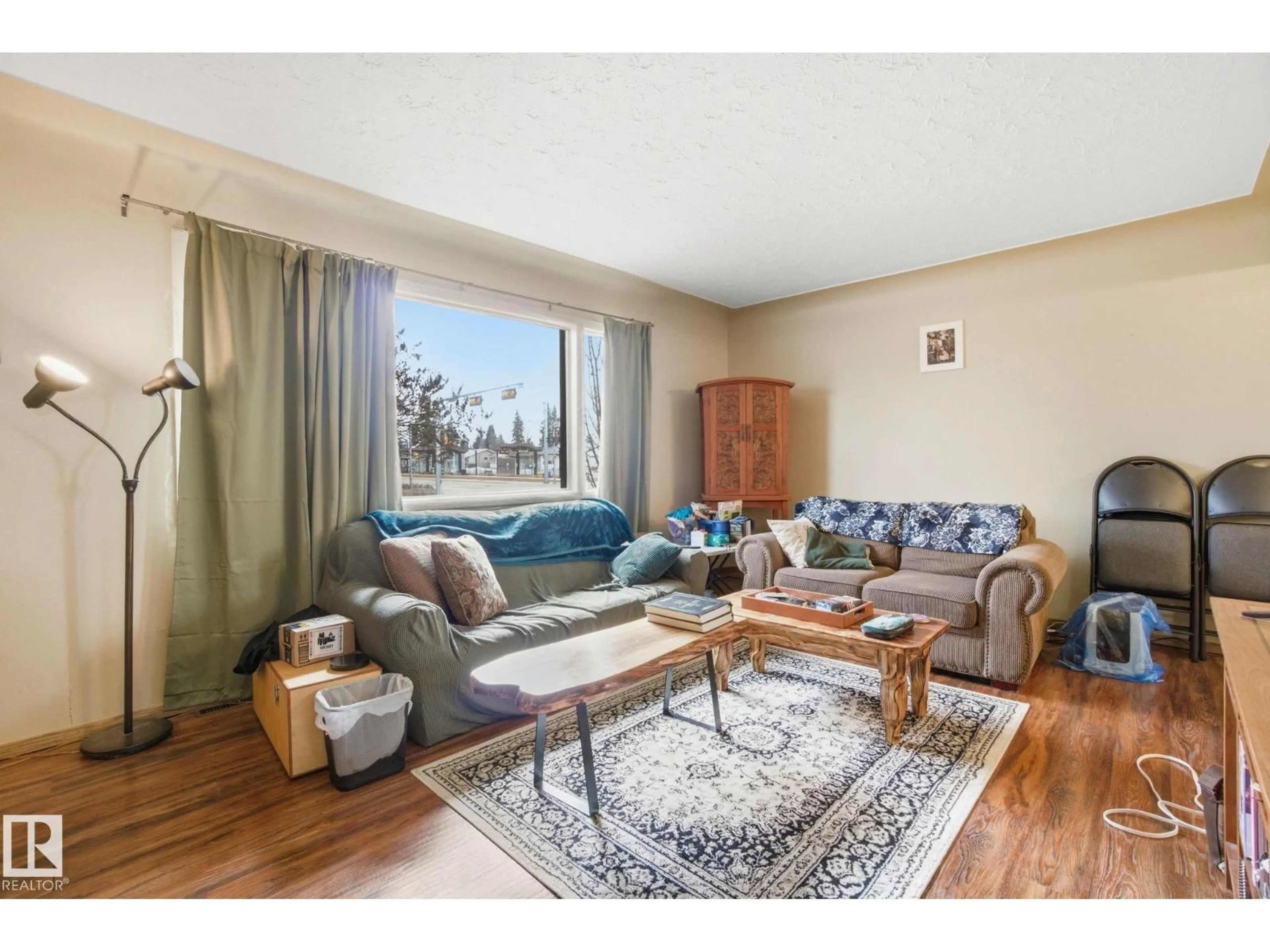 Living room with furniture, unknown for 8208 73 AV, Edmonton Alberta T6C0C9