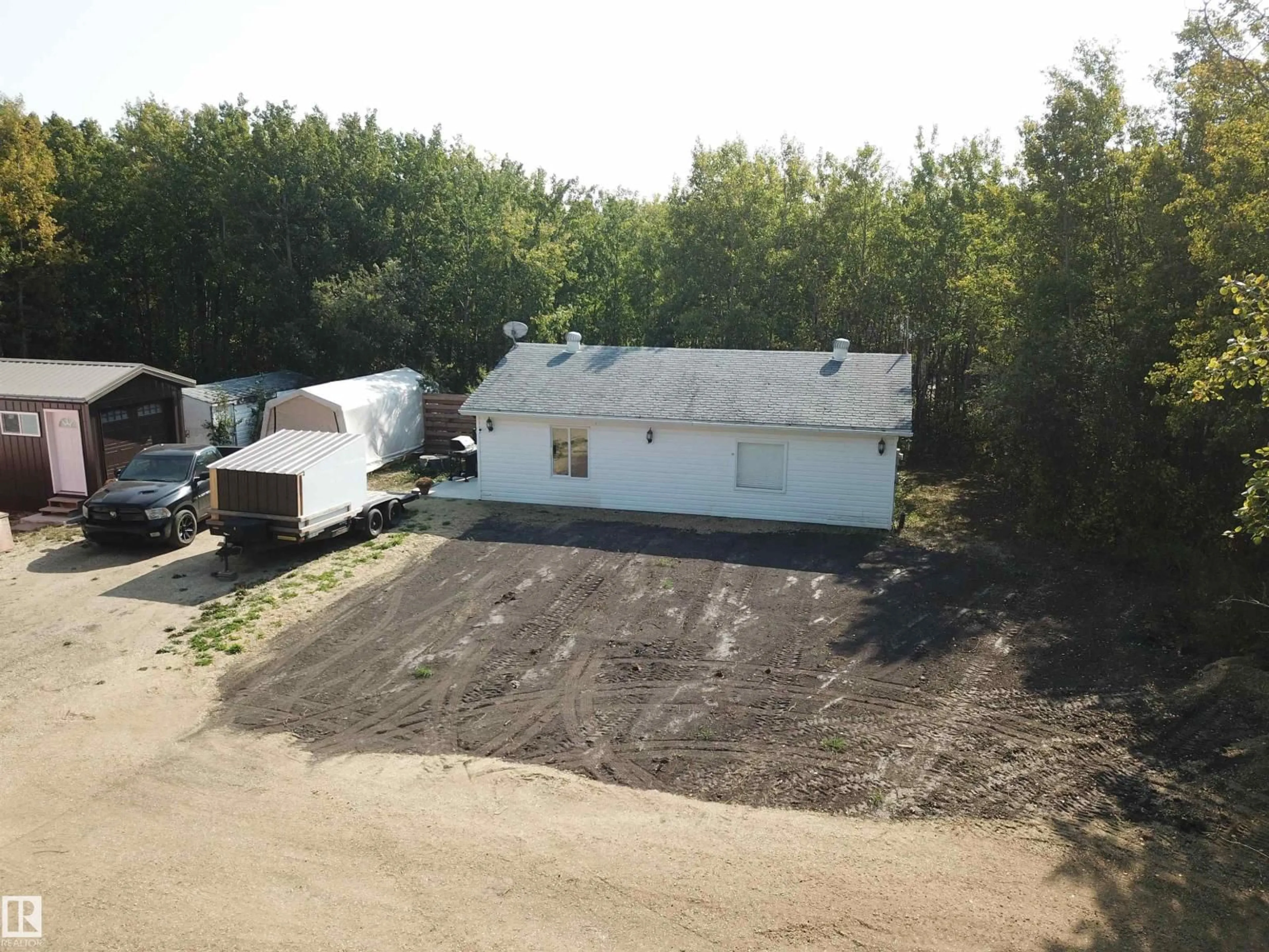 A pic from outside/outdoor area/front of a property/back of a property/a pic from drone, street for 36 20120 TWP RD 515, Rural Beaver County Alberta T0B4J1