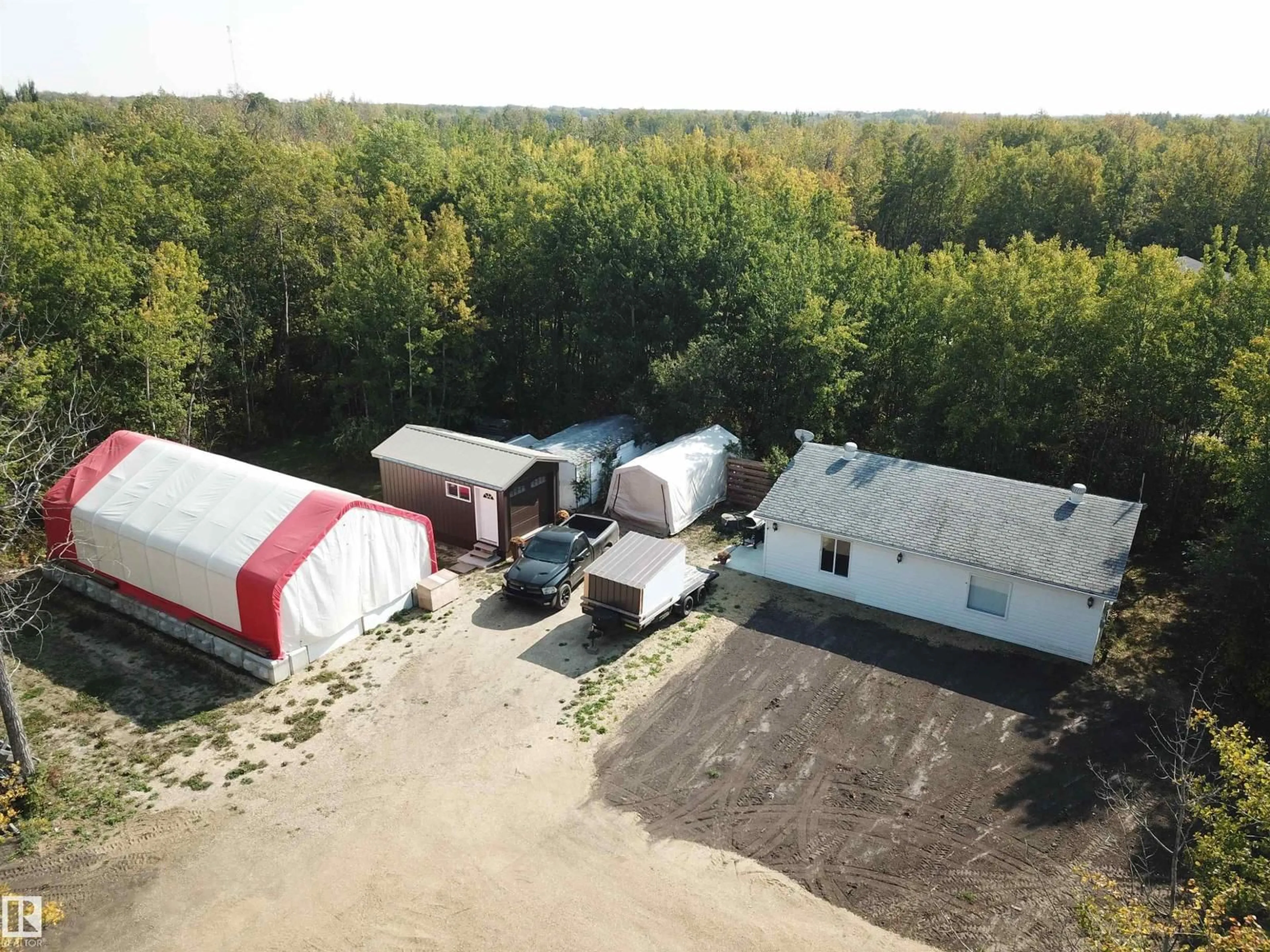 A pic from outside/outdoor area/front of a property/back of a property/a pic from drone, building for 36 20120 TWP RD 515, Rural Beaver County Alberta T0B4J1