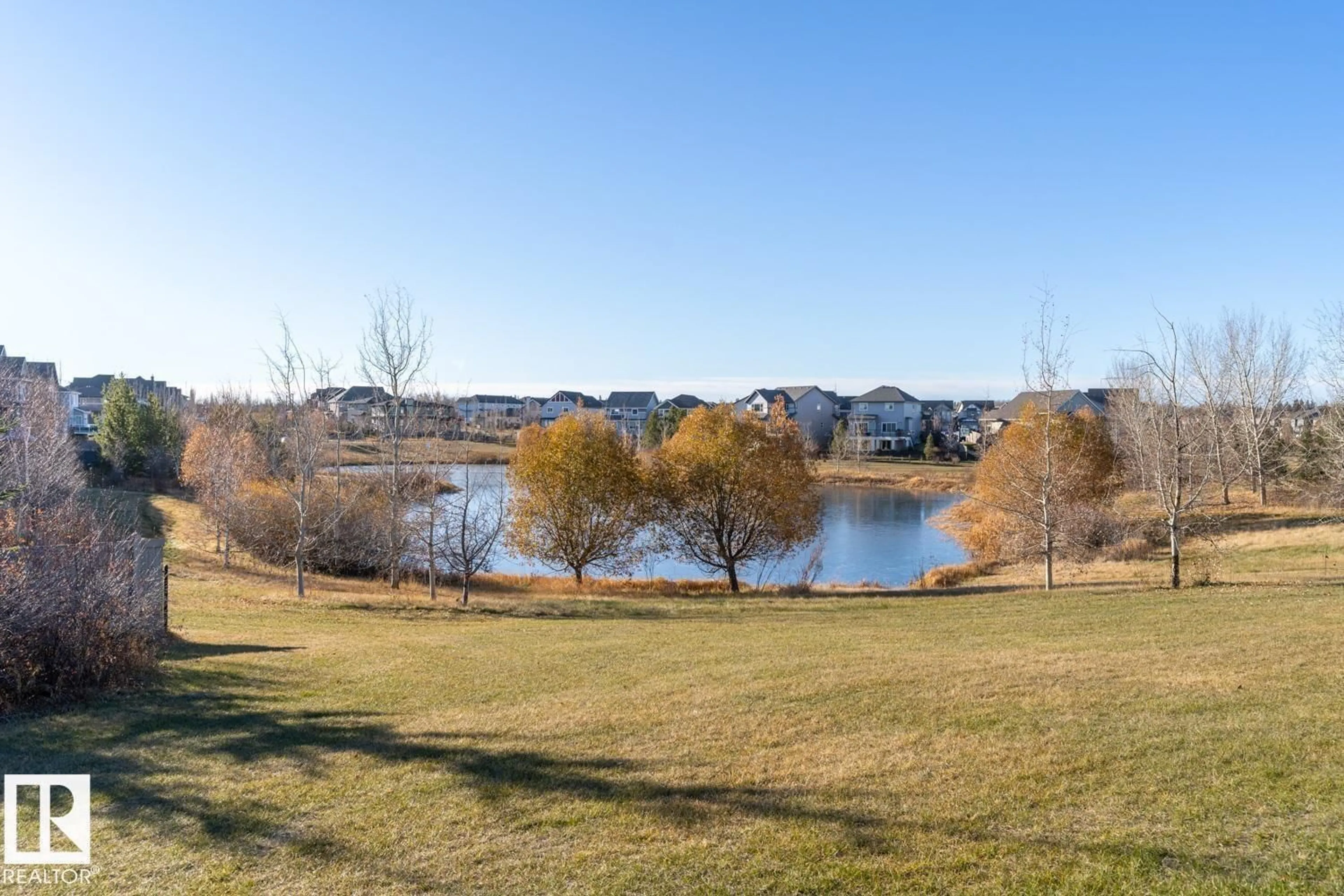 A pic from outside/outdoor area/front of a property/back of a property/a pic from drone, water/lake/river/ocean view for NW - 13011 202 ST, Edmonton Alberta T5S0E2