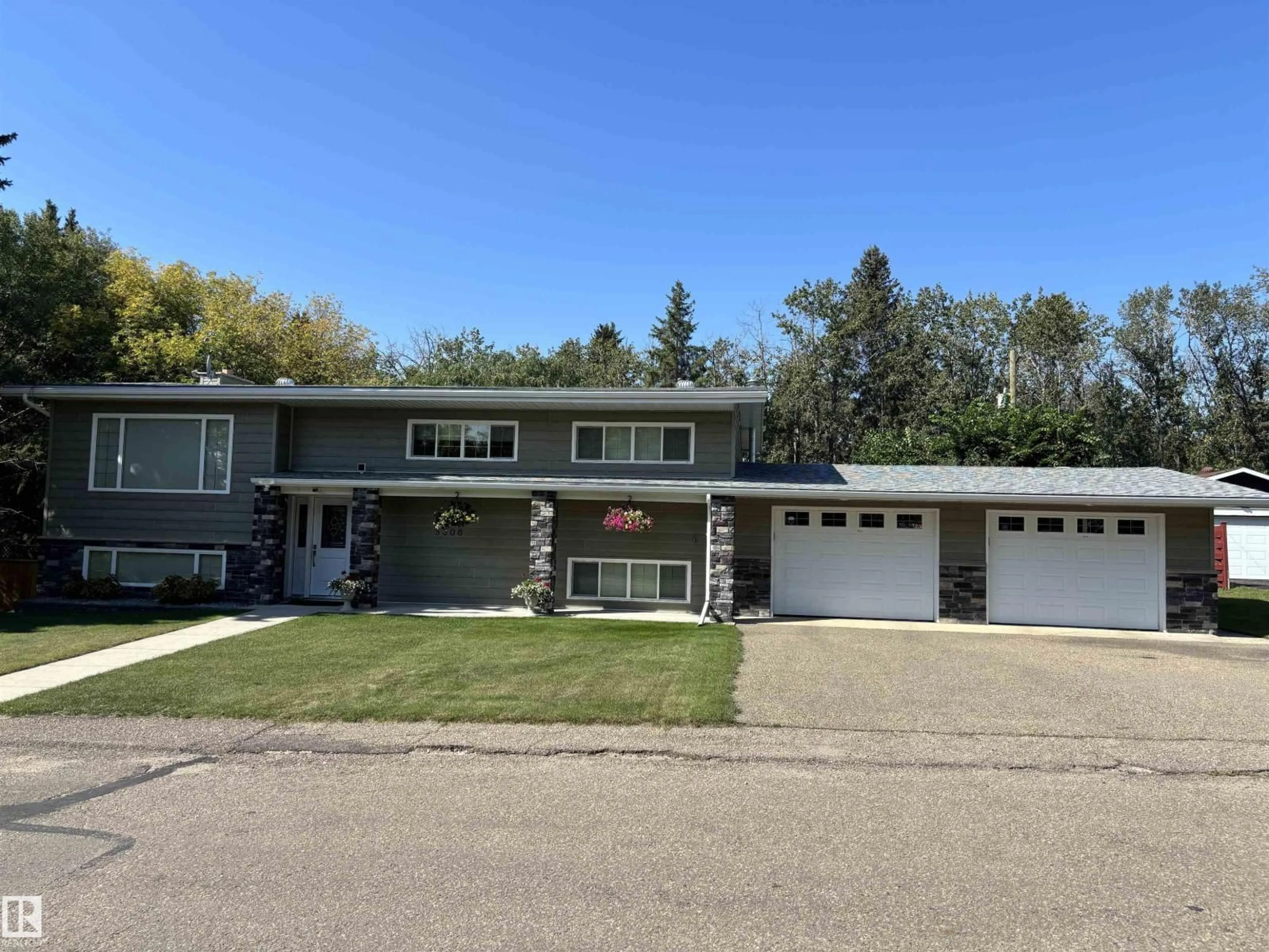 Home with vinyl exterior material, street for 5306 52 ST, Elk Point Alberta T0A1A0