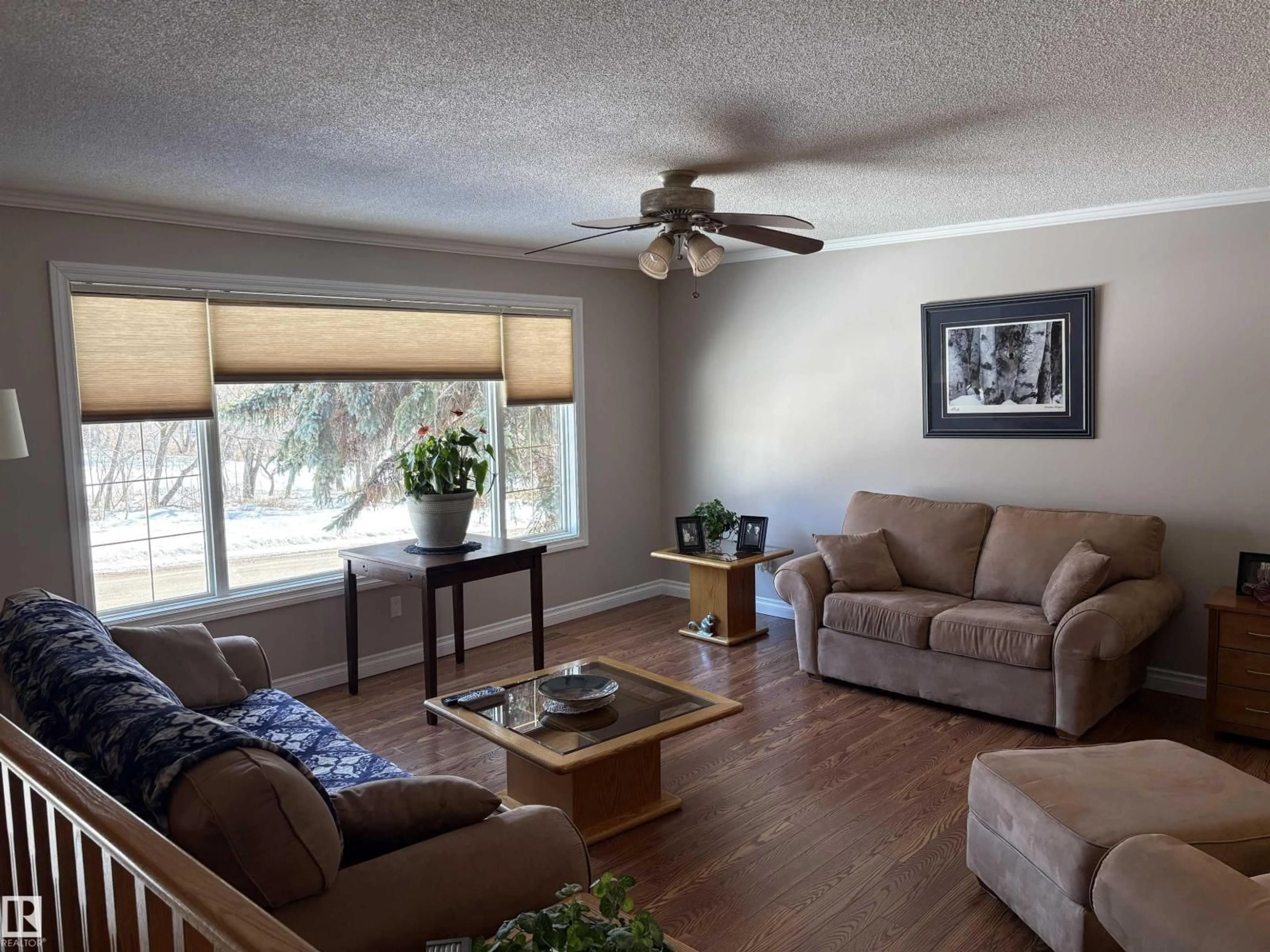 Living room with furniture, wood/laminate floor for 5306 52 ST, Elk Point Alberta T0A1A0