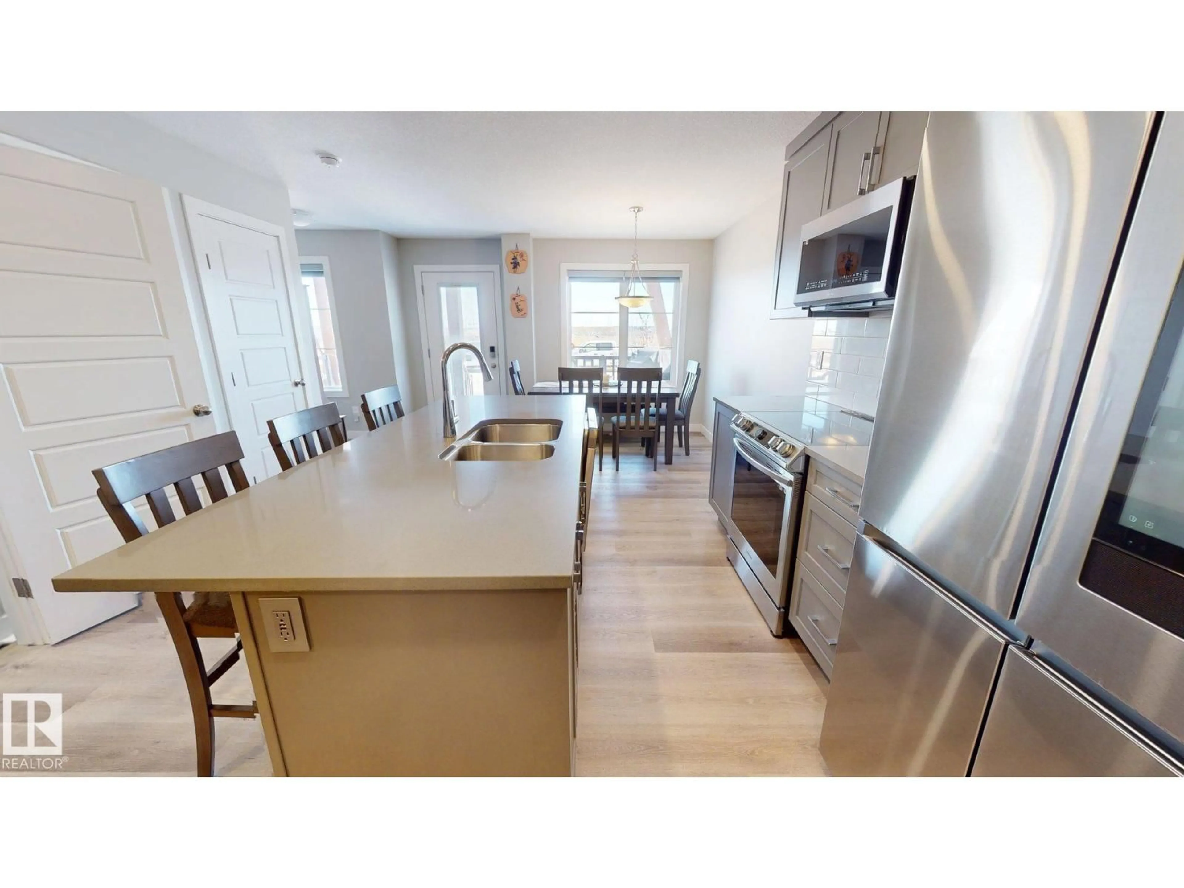 Open concept kitchen, unknown for 998 STILLWATER BV, Edmonton Alberta T6M1M8