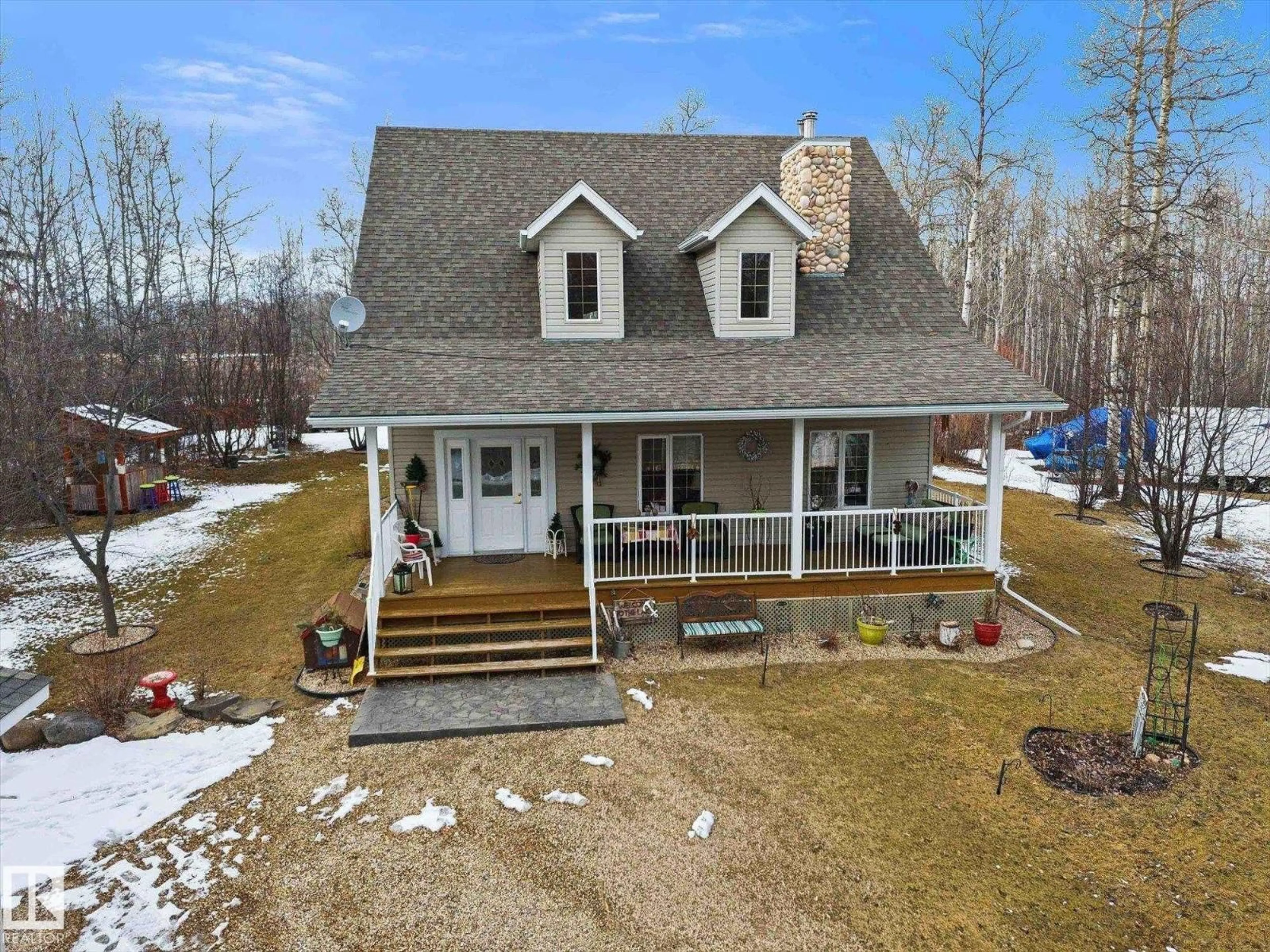 A pic from outside/outdoor area/front of a property/back of a property/a pic from drone, unknown for 460 - 48057 RGE RD 272, Rural Leduc County Alberta T0C2C0