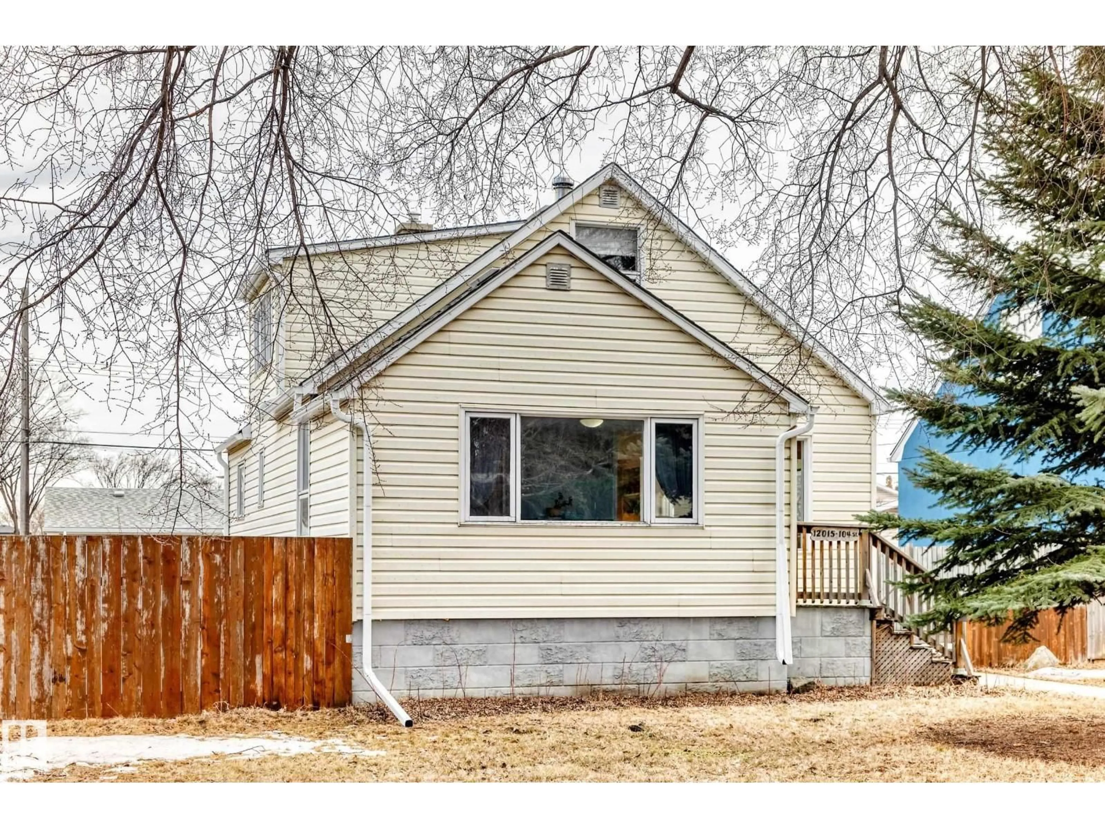 Home with vinyl exterior material, street for NW - 12015 104 ST, Edmonton Alberta T5G2L5