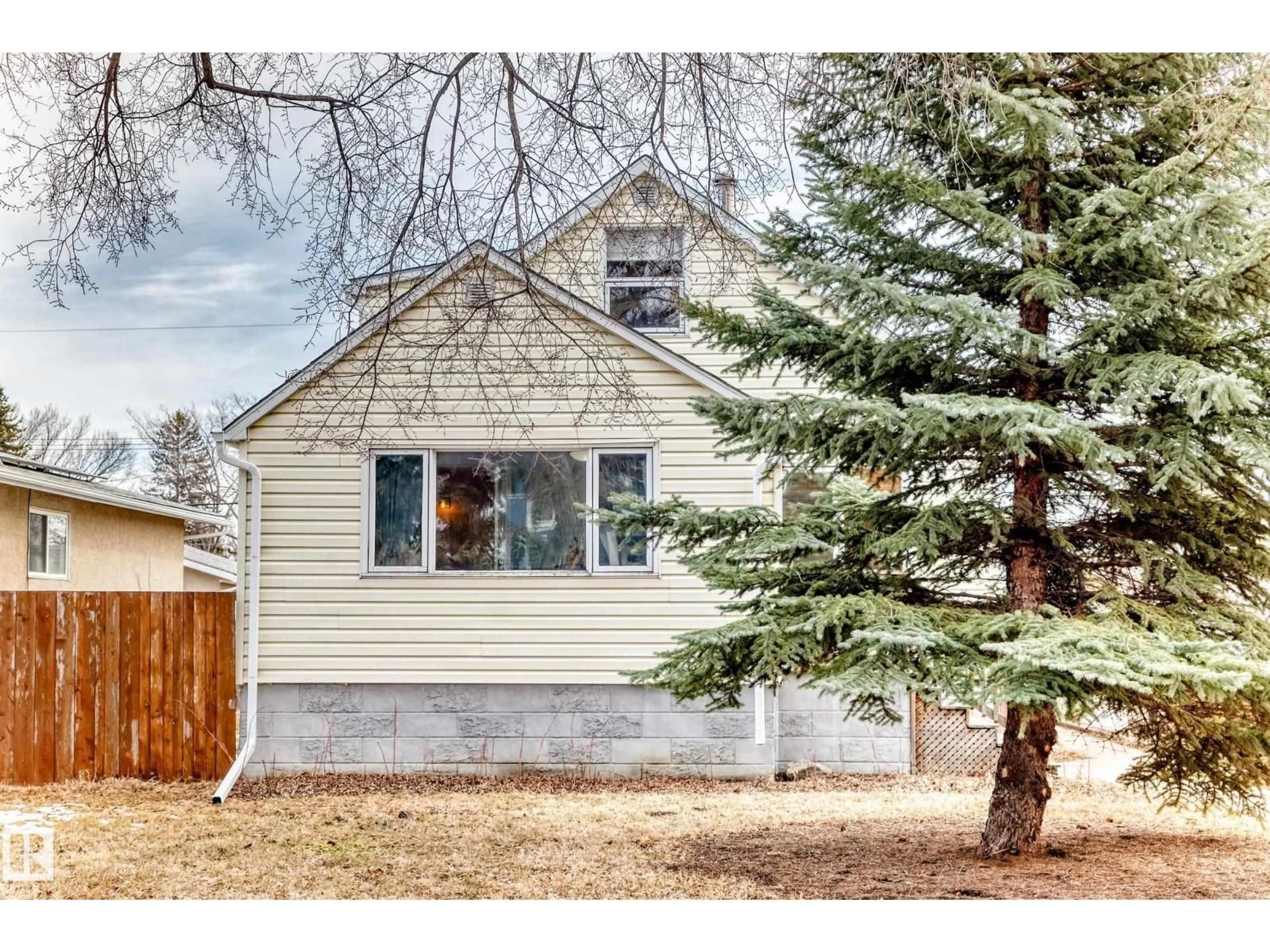 Home with vinyl exterior material, street for NW - 12015 104 ST, Edmonton Alberta T5G2L5