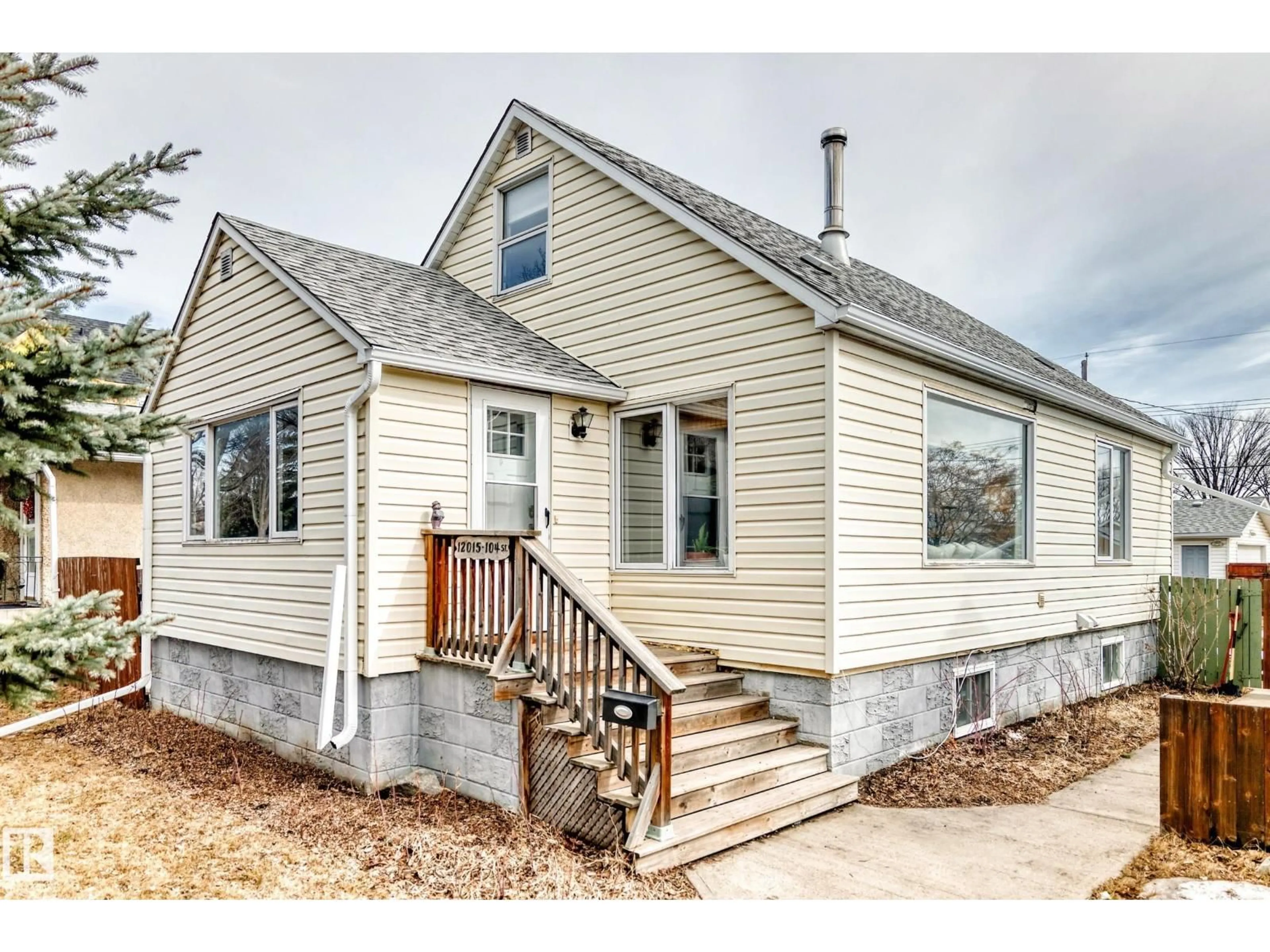 Home with vinyl exterior material, street for NW - 12015 104 ST, Edmonton Alberta T5G2L5