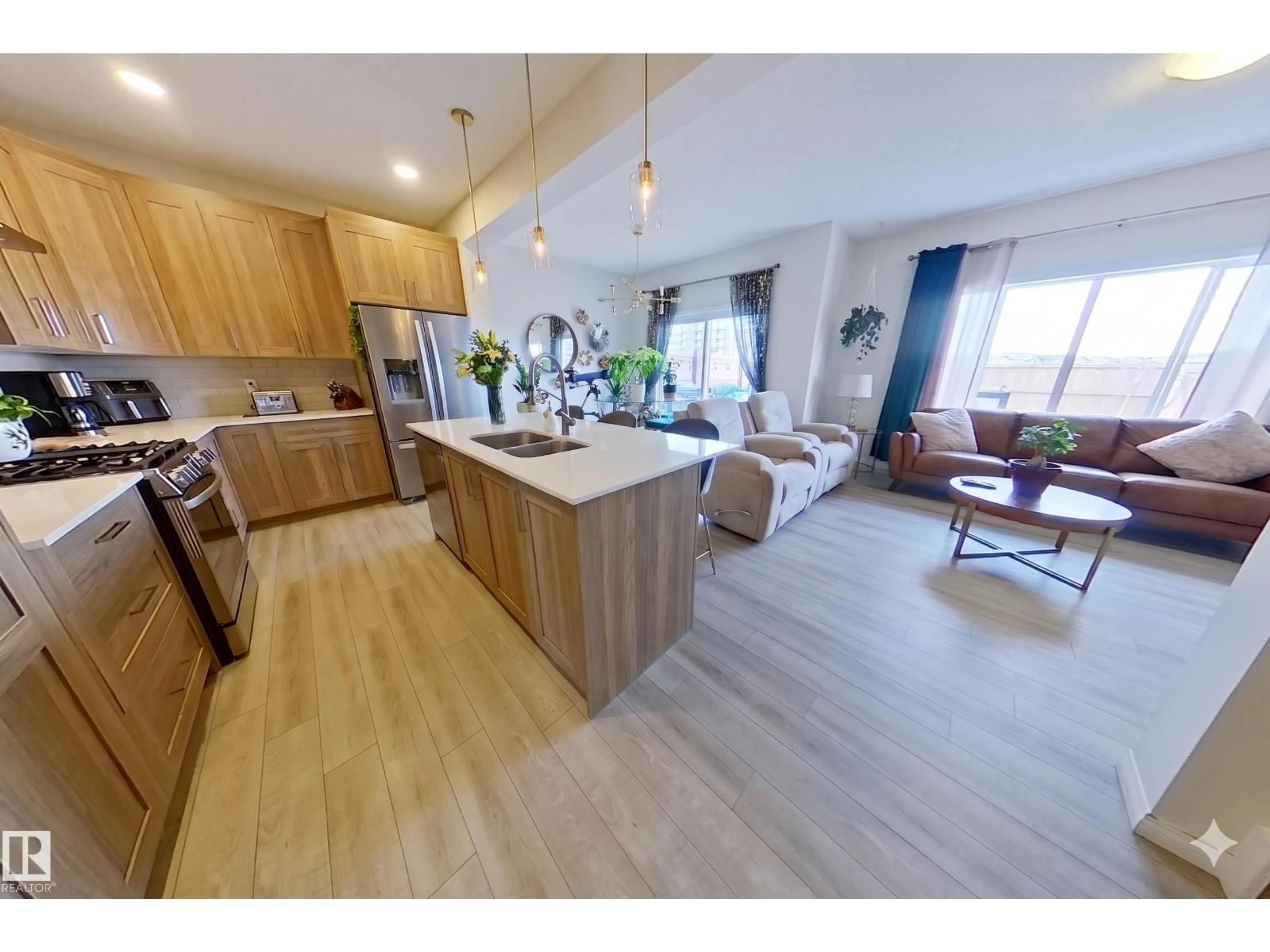 Open concept kitchen, wood/laminate floor for SW - 2763 COLLINS CR, Edmonton Alberta T6W4G8