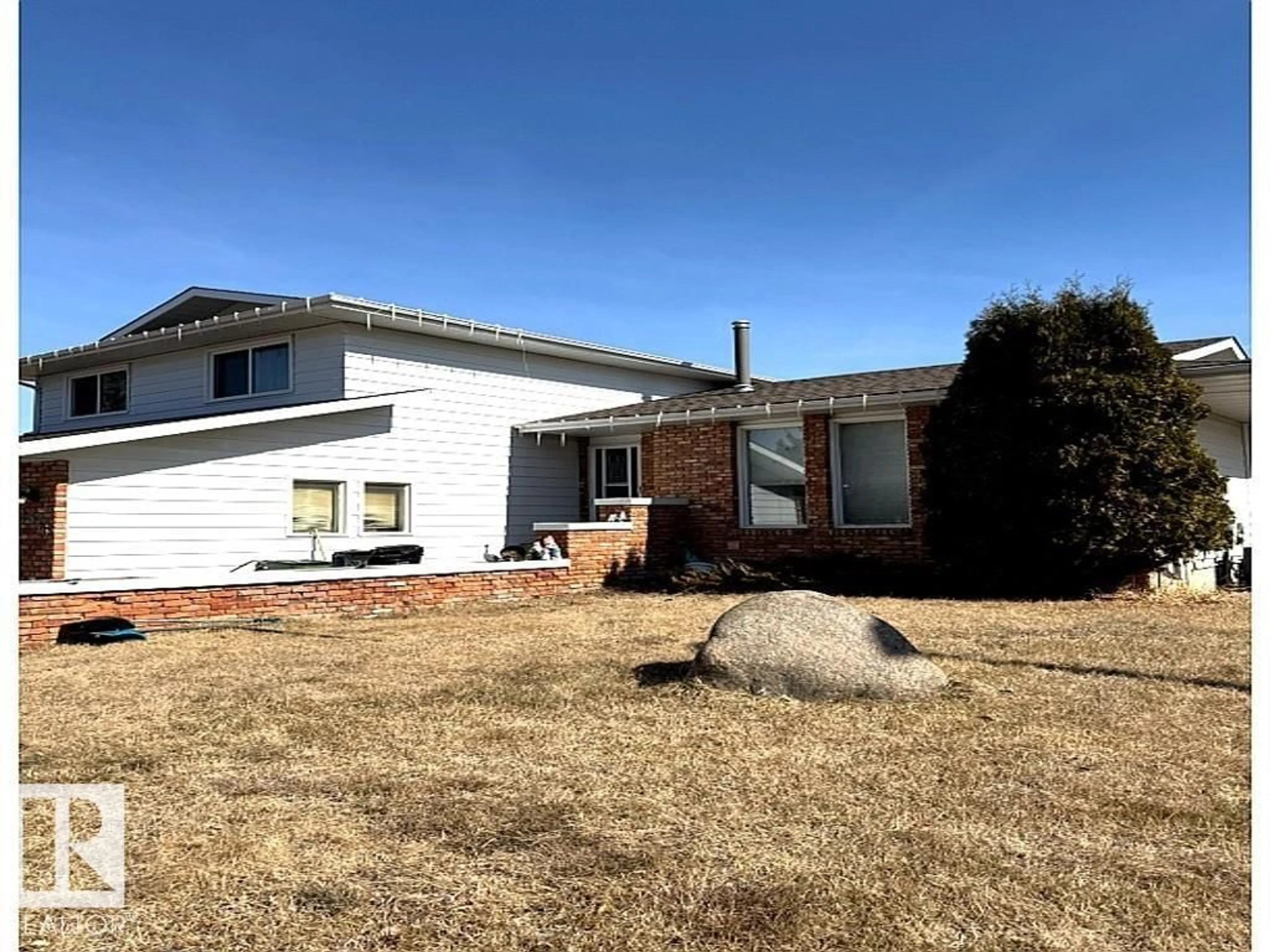 A pic from outside/outdoor area/front of a property/back of a property/a pic from drone, unknown for 1835 104A ST, Edmonton Alberta T6J5C1