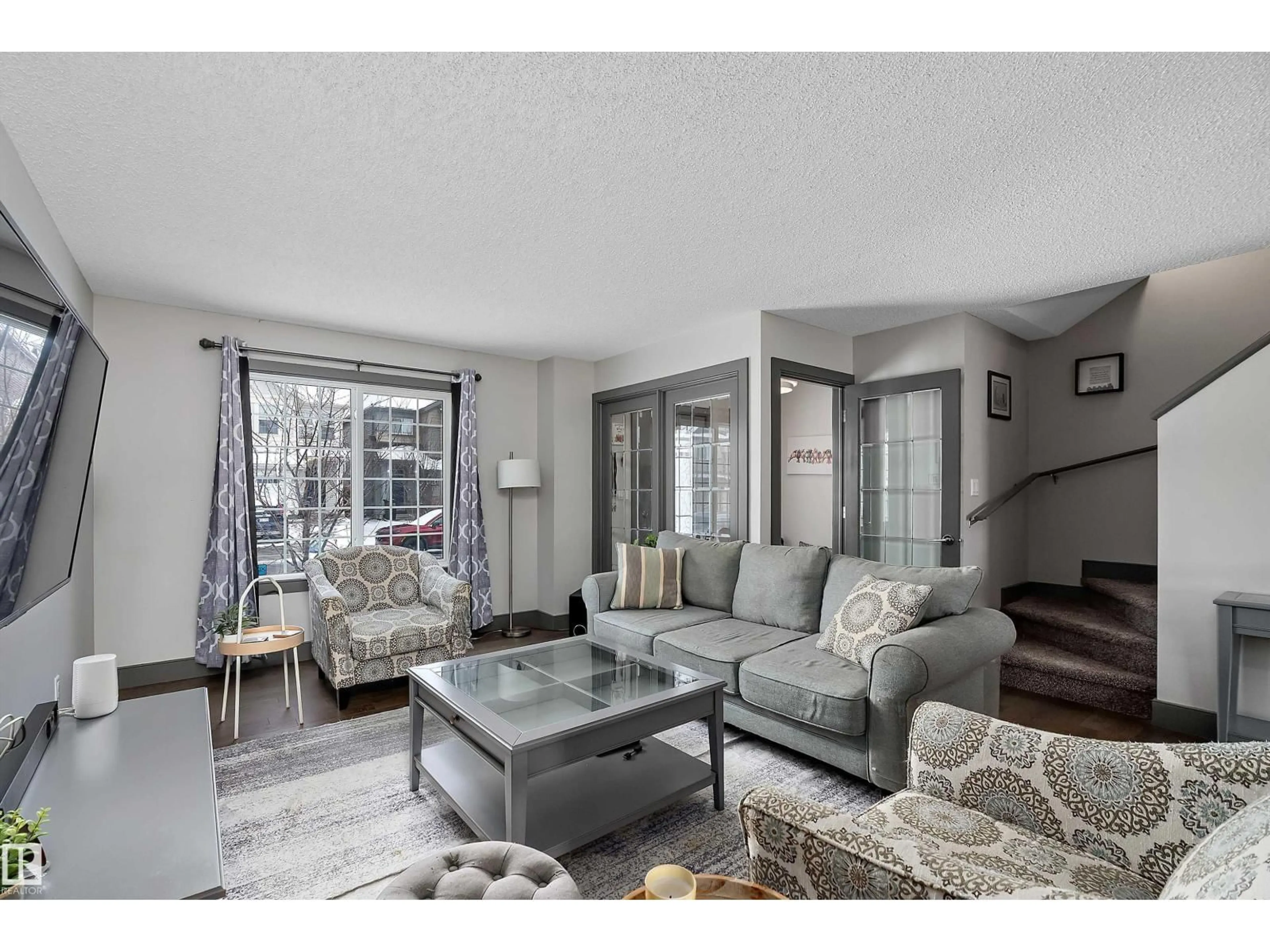 Living room with furniture, unknown for 7776 EIFERT CRESCENT, Edmonton Alberta T6M0W1