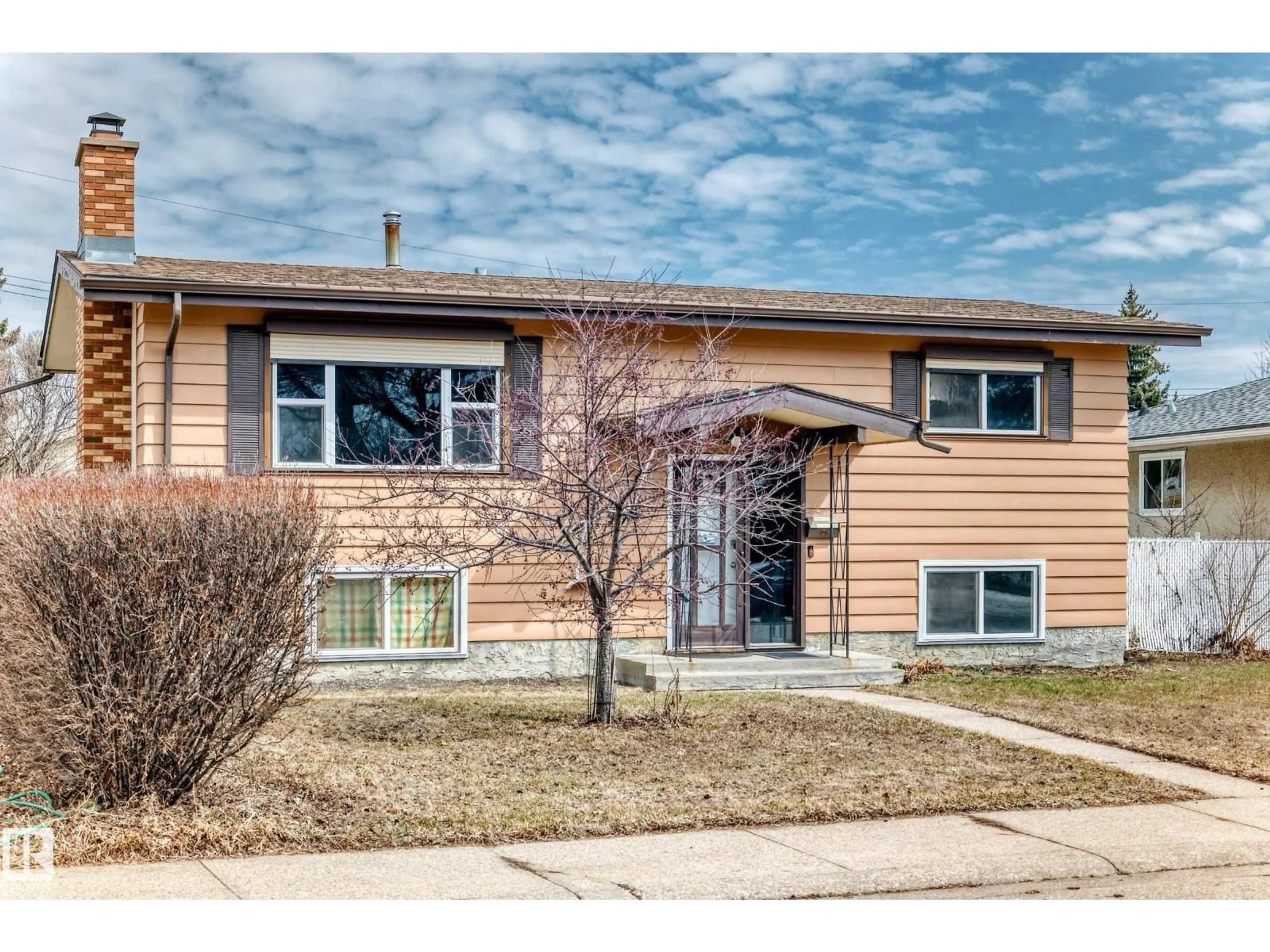 Home with vinyl exterior material, street for 13419 70 ST, Edmonton Alberta T5C0K2