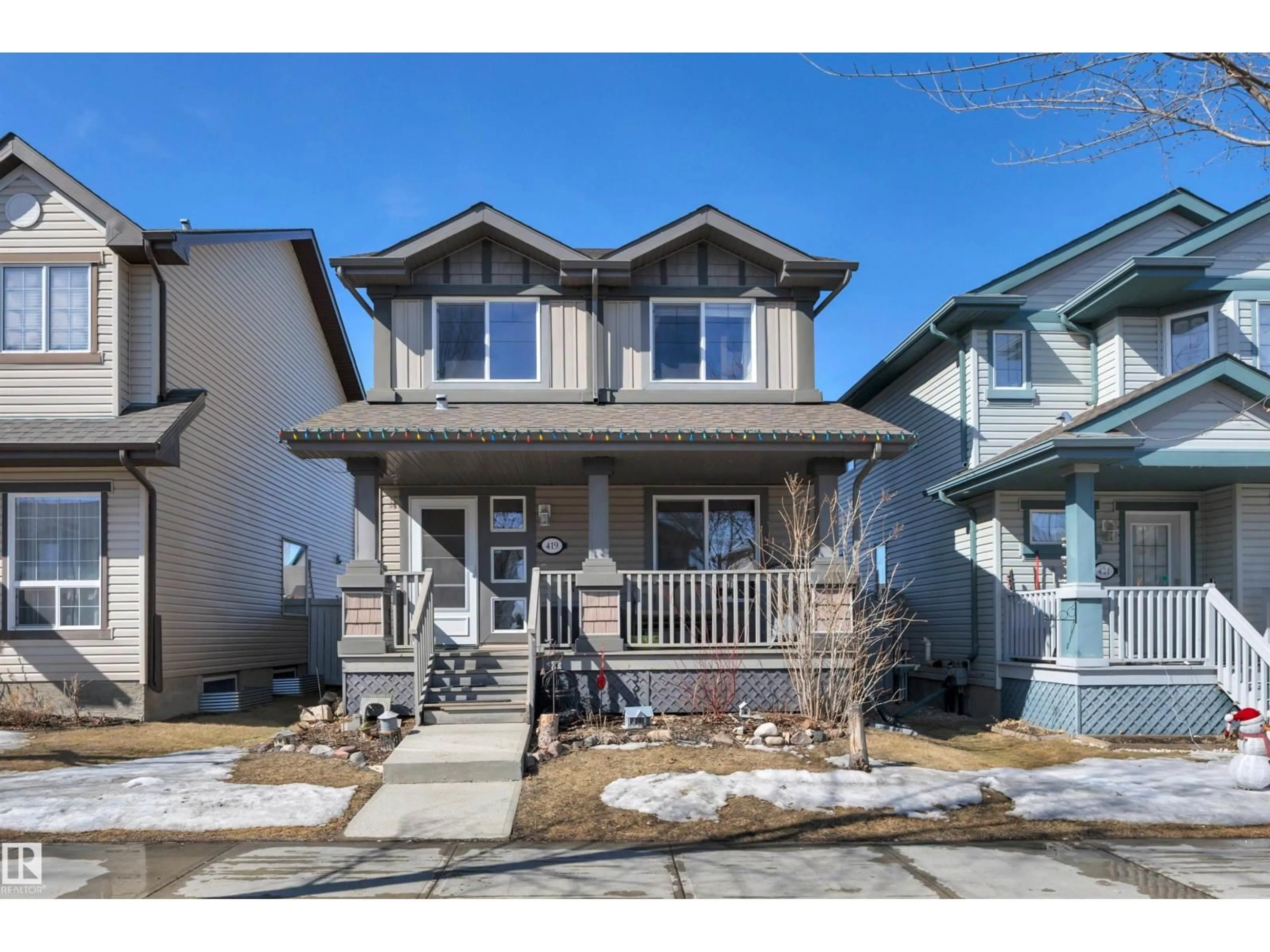 Home with vinyl exterior material, street for 419 HEMINGWAY RD, Edmonton Alberta T6M0J8