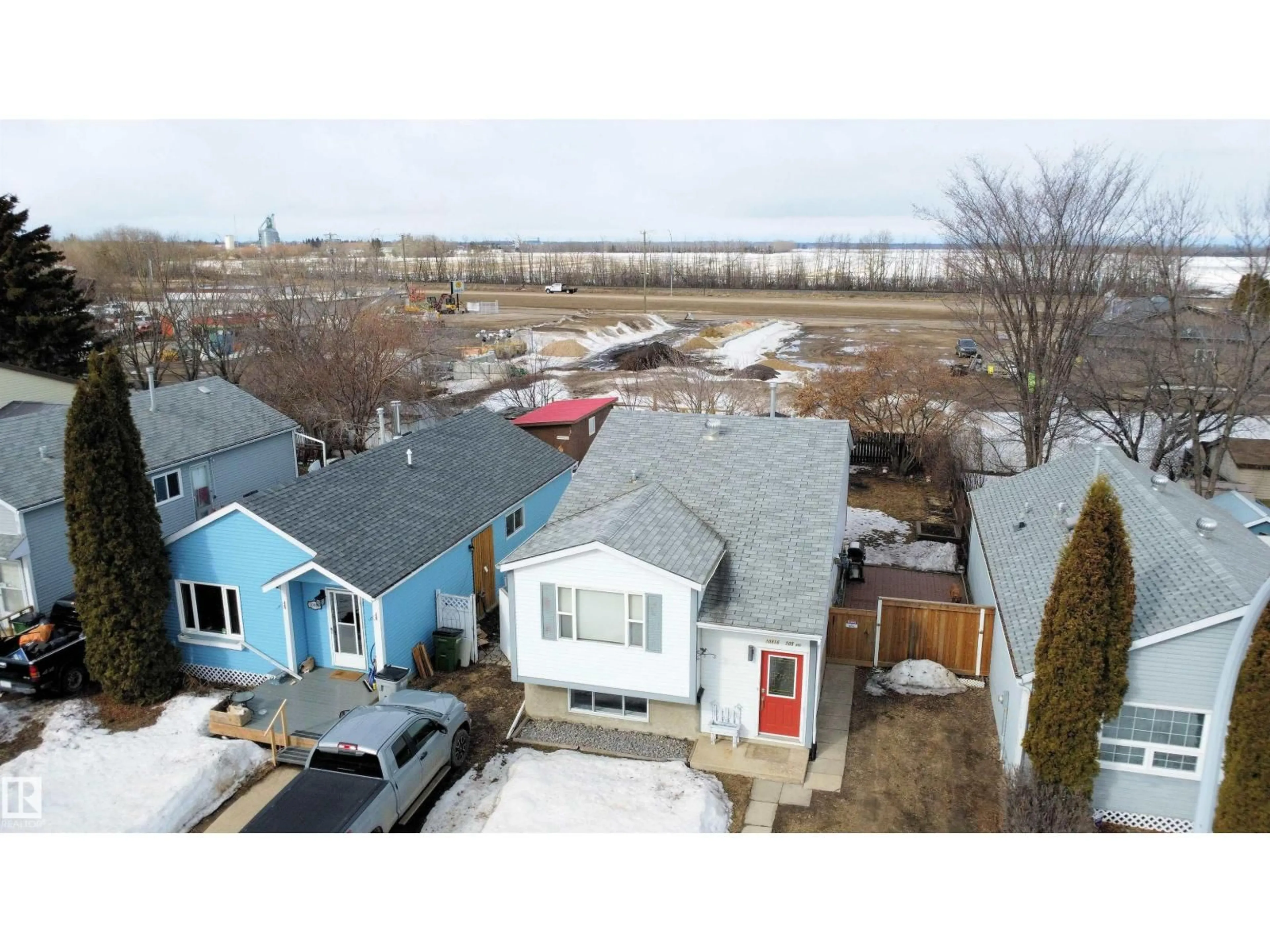 A pic from outside/outdoor area/front of a property/back of a property/a pic from drone, street for 10916 105 AV, Westlock Alberta T7P1A8