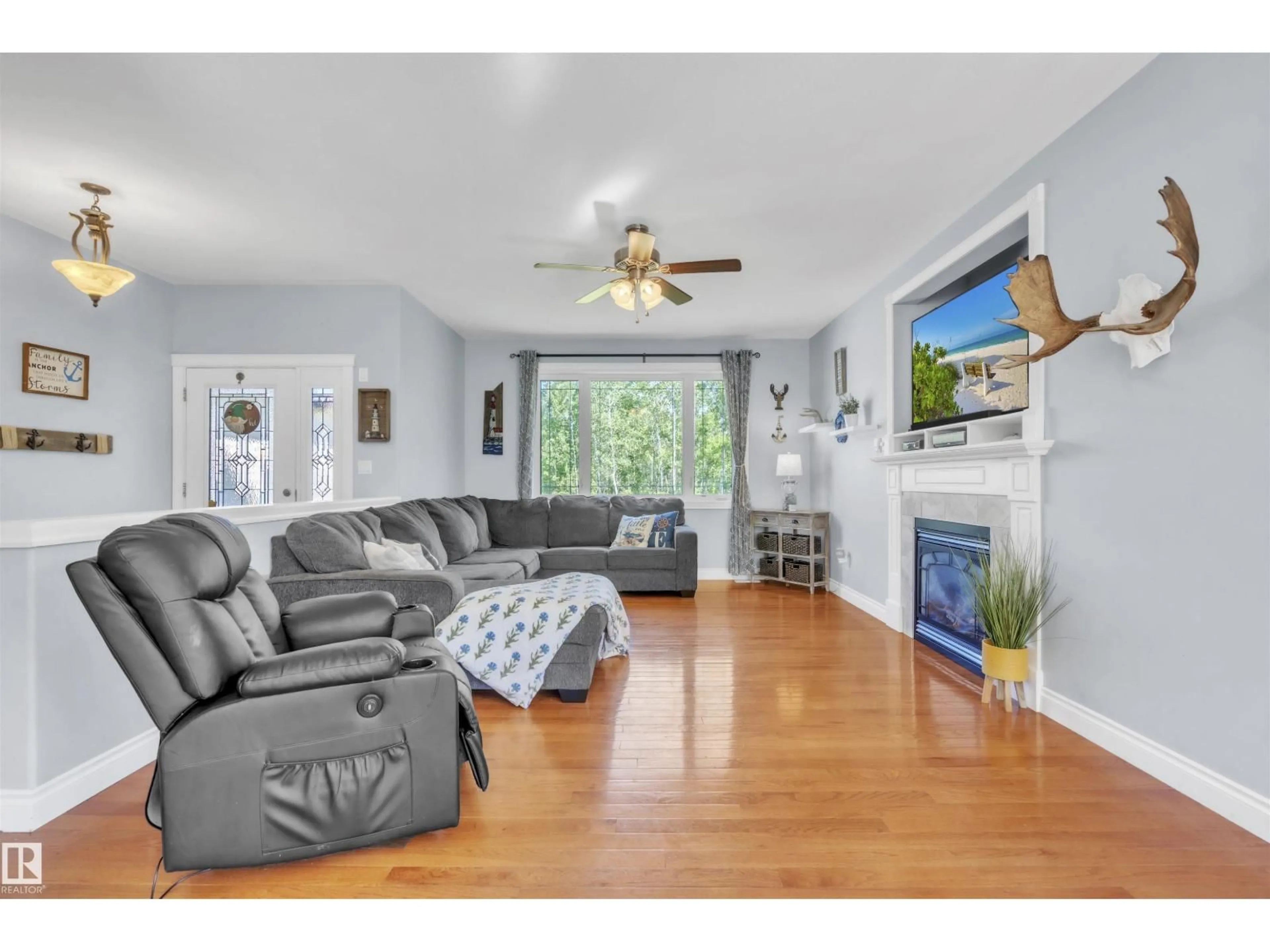 Living room with furniture, wood/laminate floor for 5 RGE RD 421, Rural Bonnyville M.D. Alberta T9M1P2