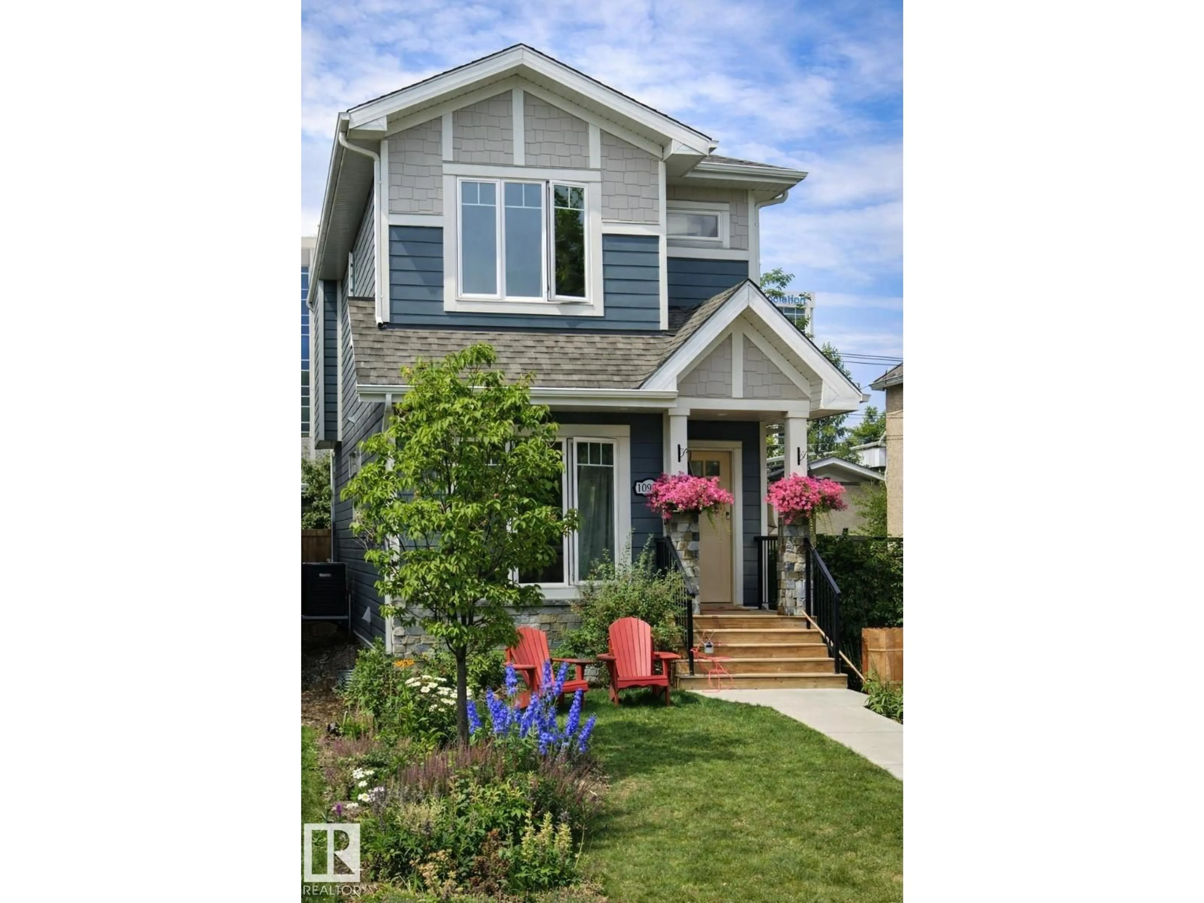 Home with vinyl exterior material, street for NW - 10972 141 ST, Edmonton Alberta T5M1T4