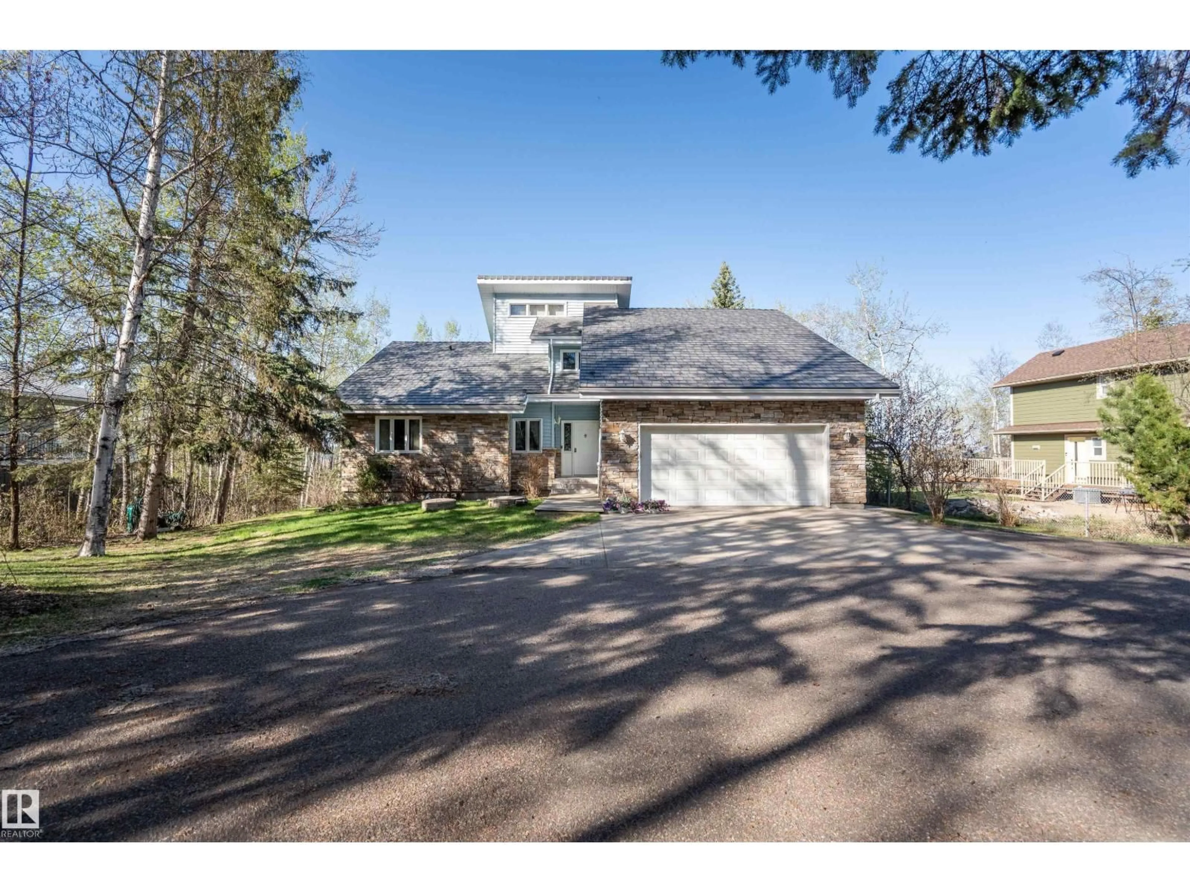 A pic from outside/outdoor area/front of a property/back of a property/a pic from drone, street for 36 - 45320 TWP RD 593 A, Rural Bonnyville M.D. Alberta T9N2J6