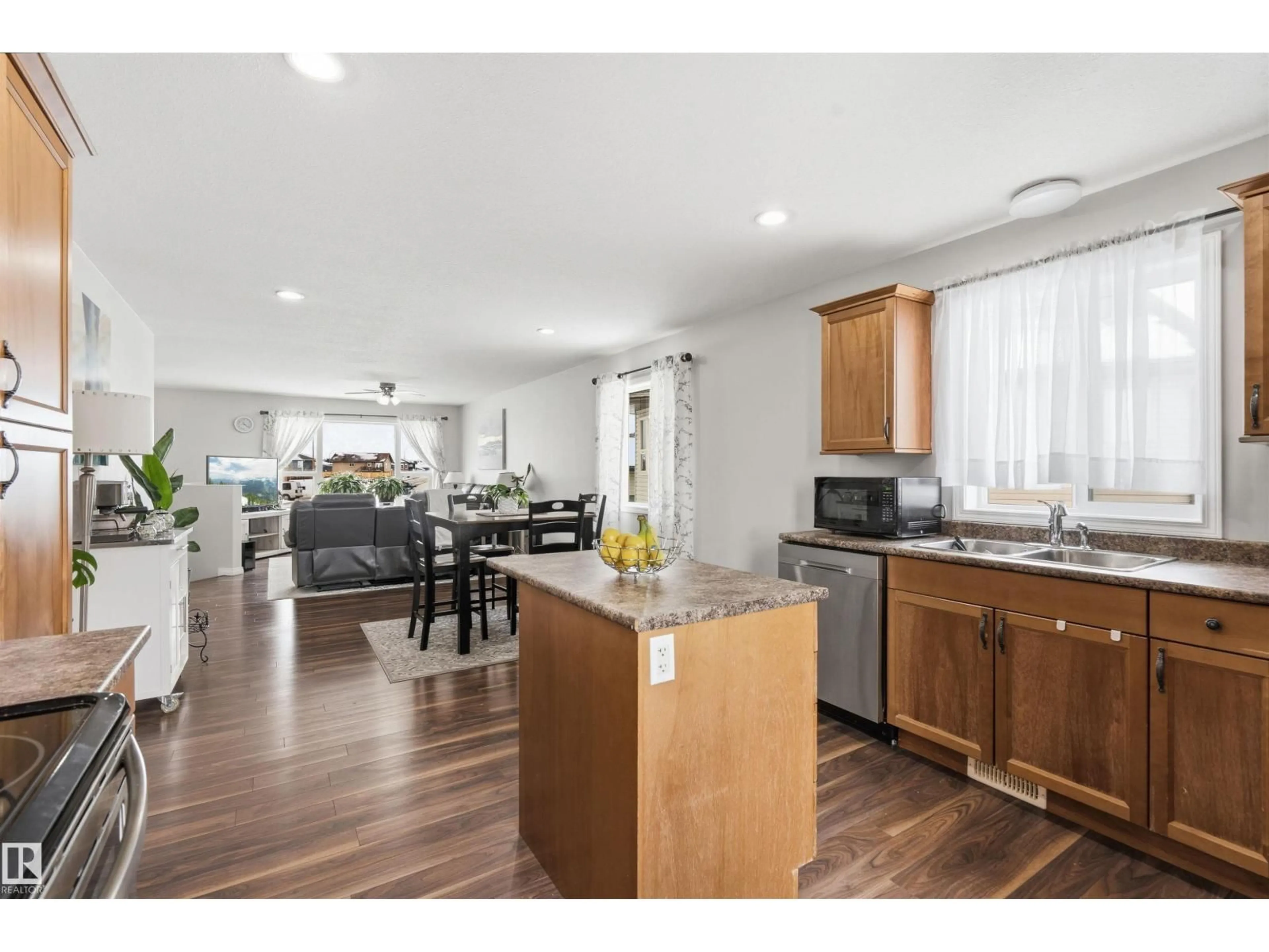 Open concept kitchen, wood/laminate floor for 6201 45 ST, Cold Lake Alberta T9M2B5