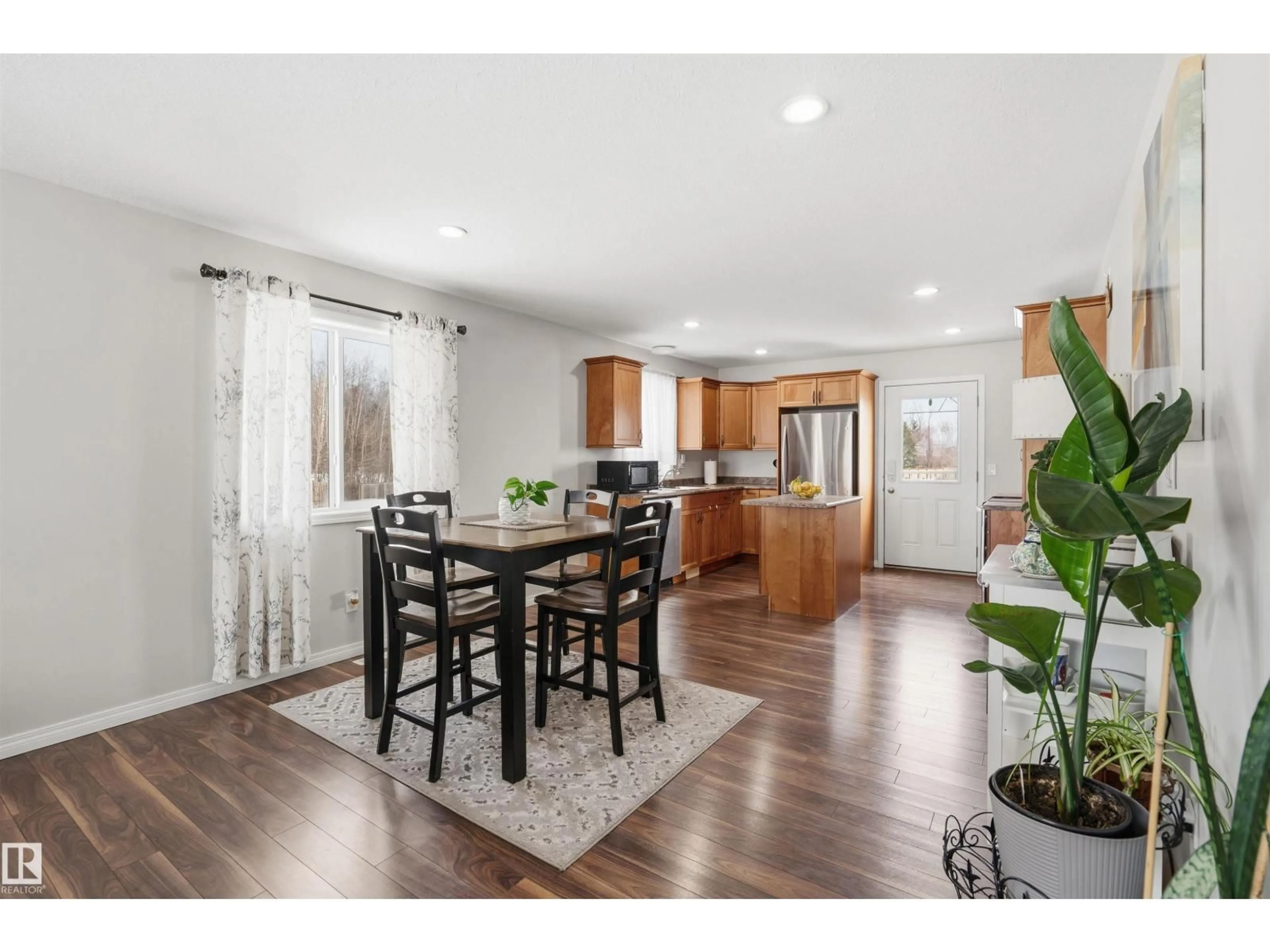 Open concept kitchen, wood/laminate floor for 6201 45 ST, Cold Lake Alberta T9M2B5