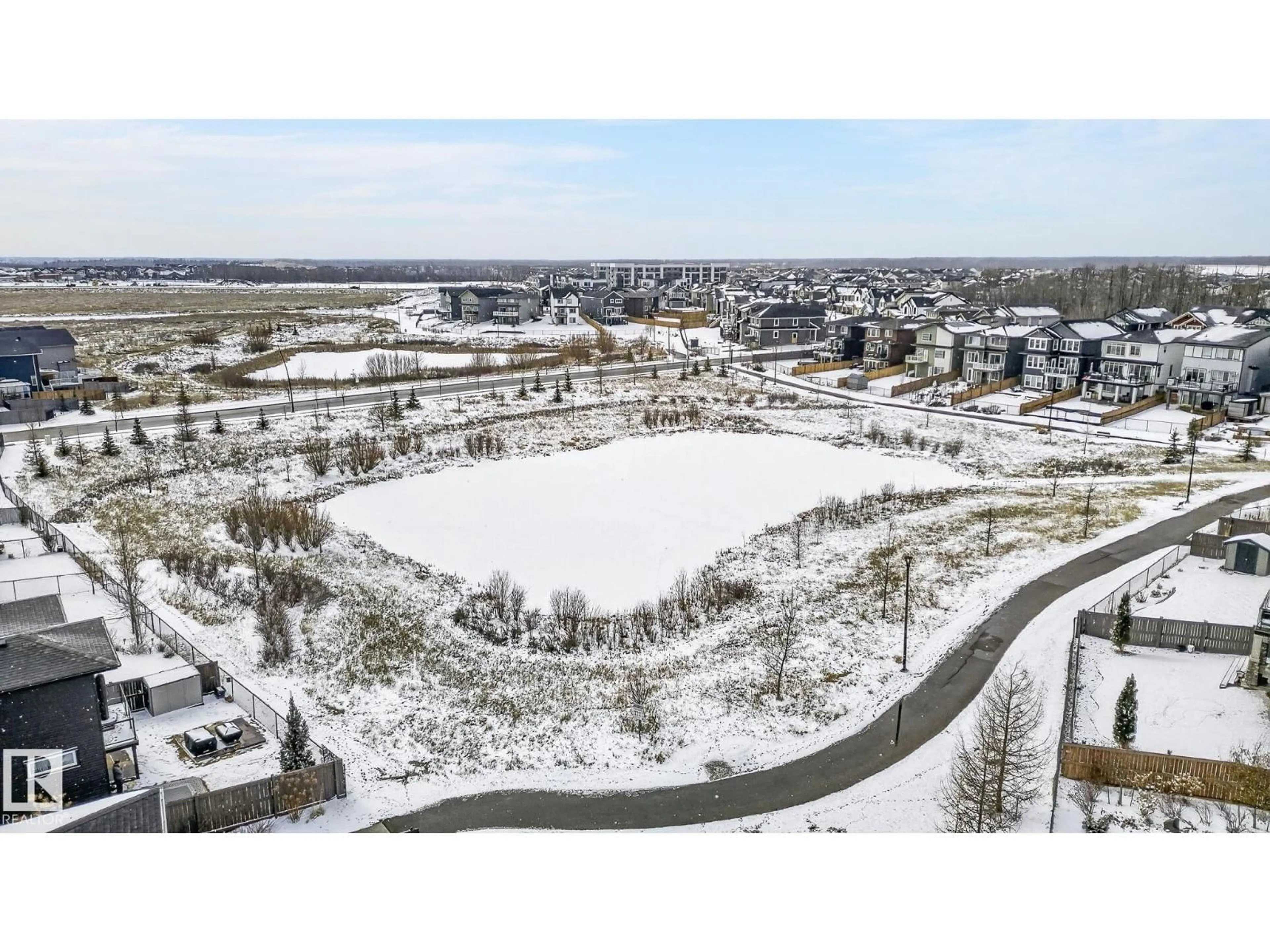 A pic from outside/outdoor area/front of a property/back of a property/a pic from drone, street for NW - 2728 202 ST, Edmonton Alberta T6M0W7