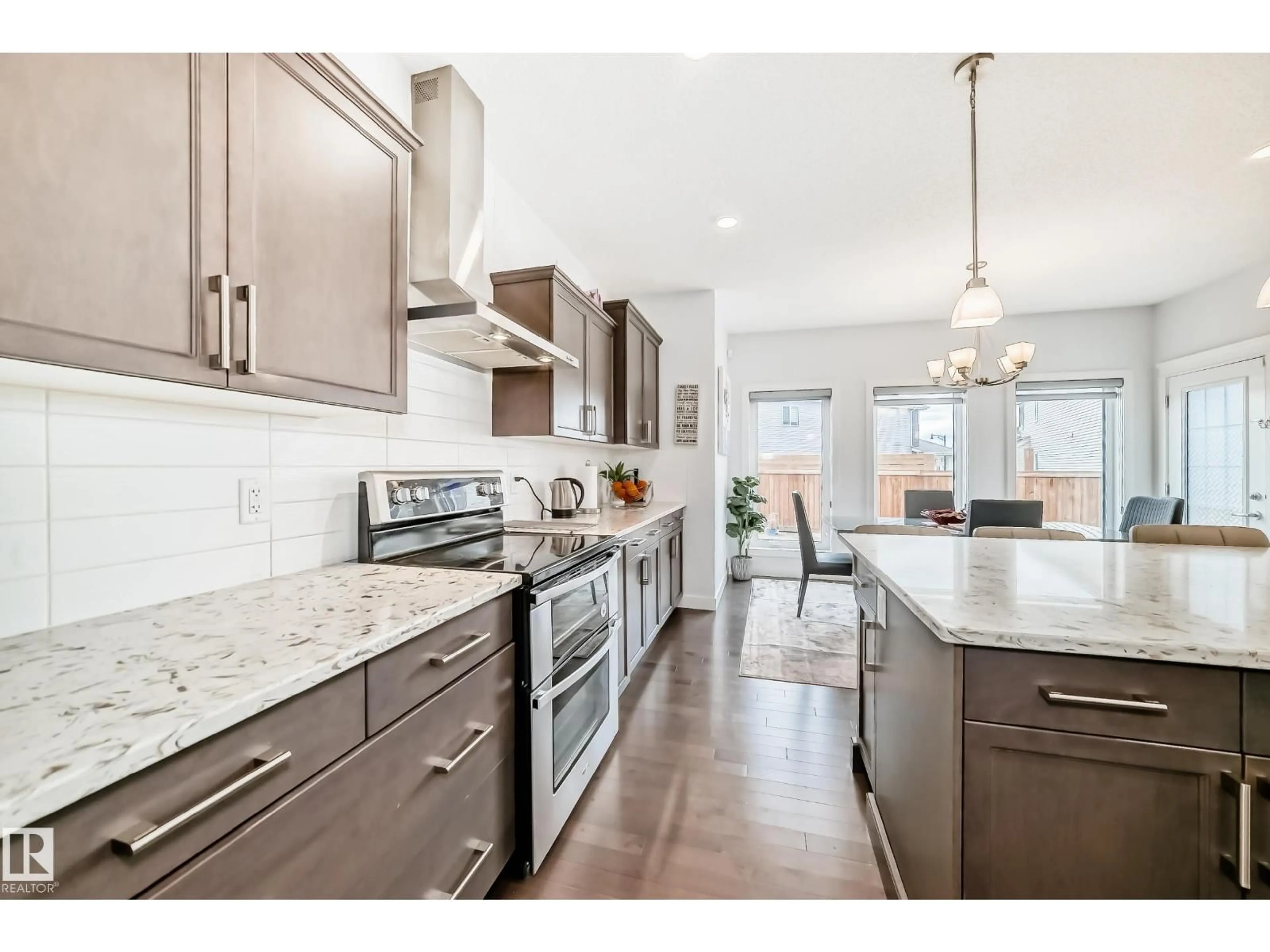 Open concept kitchen, ceramic/tile floor for SW - 922 173A ST, Edmonton Alberta T6W3V3