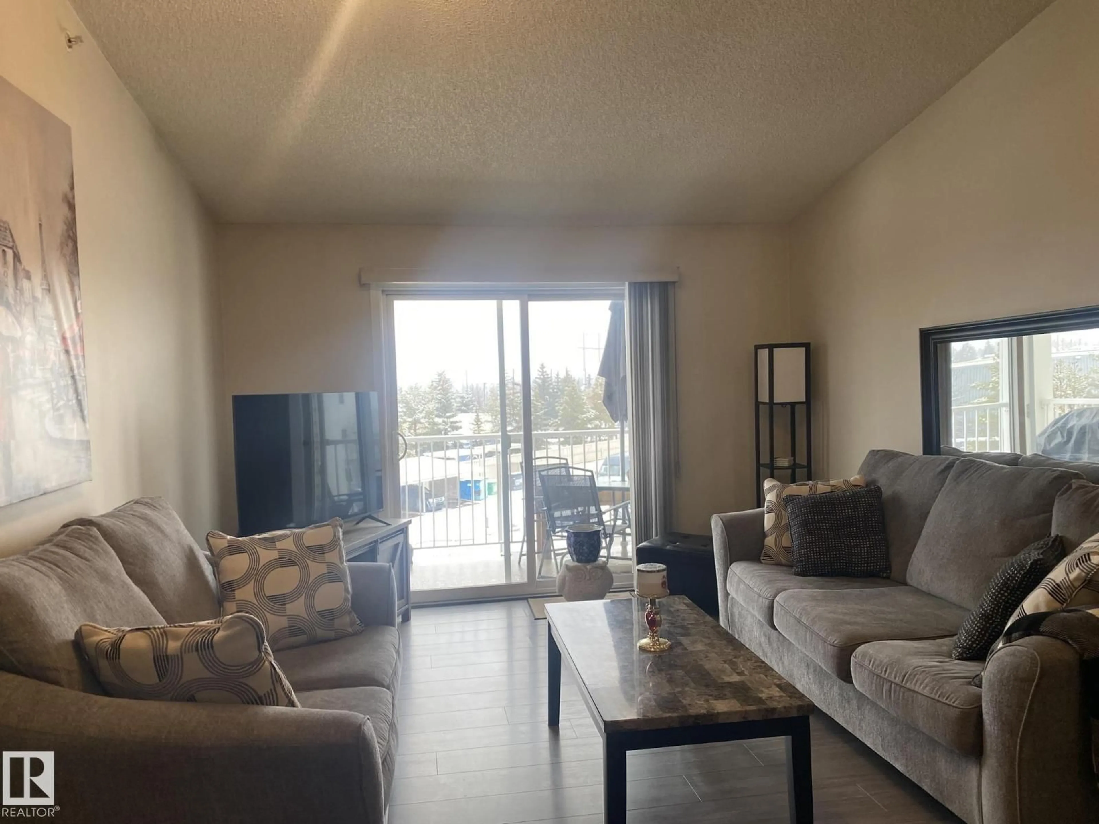 Living room with furniture, unknown for 9525 162 AV, Edmonton Alberta T5Z3V2