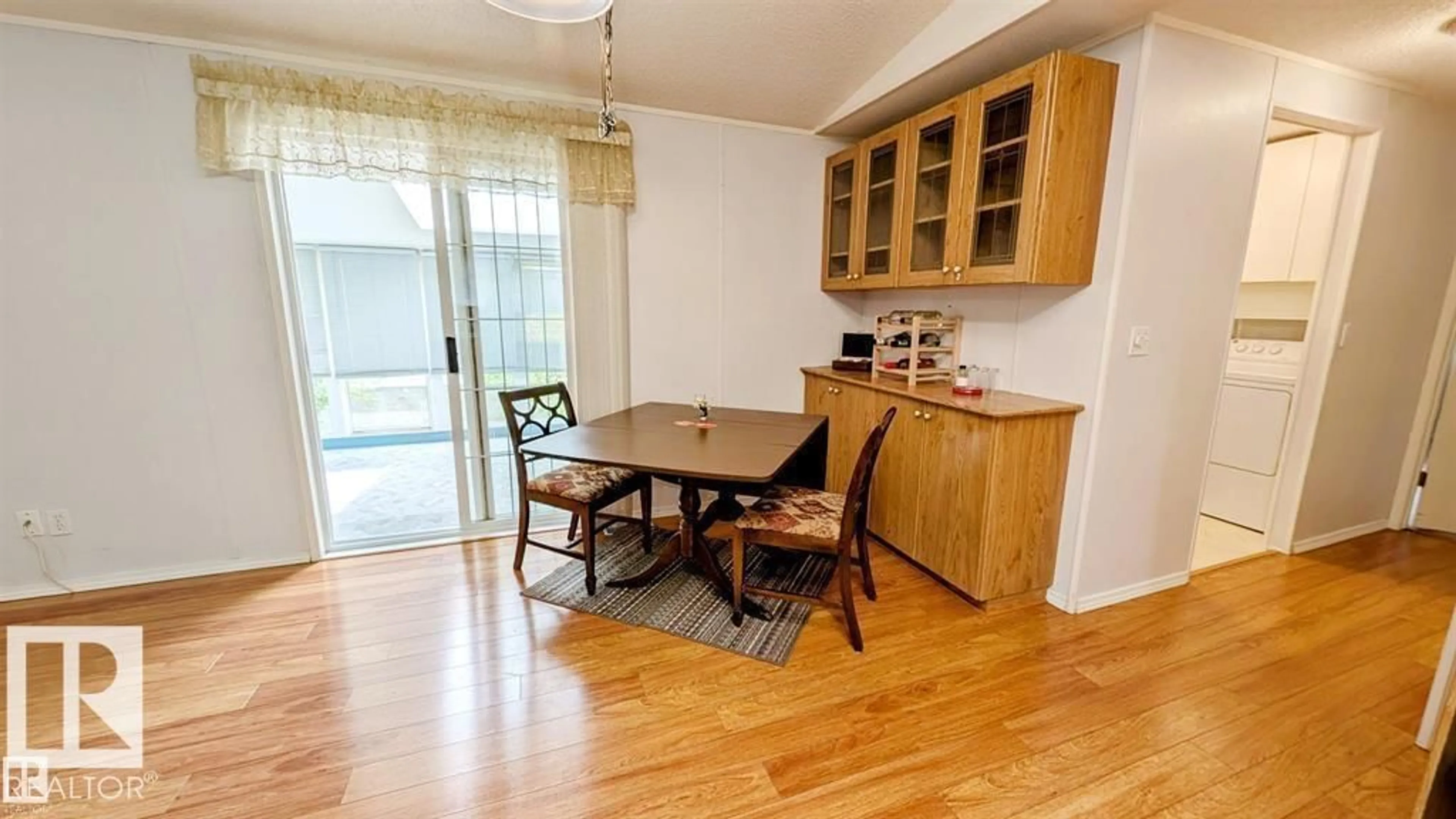 Dining room, wood/laminate floor for 1540 JUBILEE WD, Sherwood Park Alberta T8H1V2