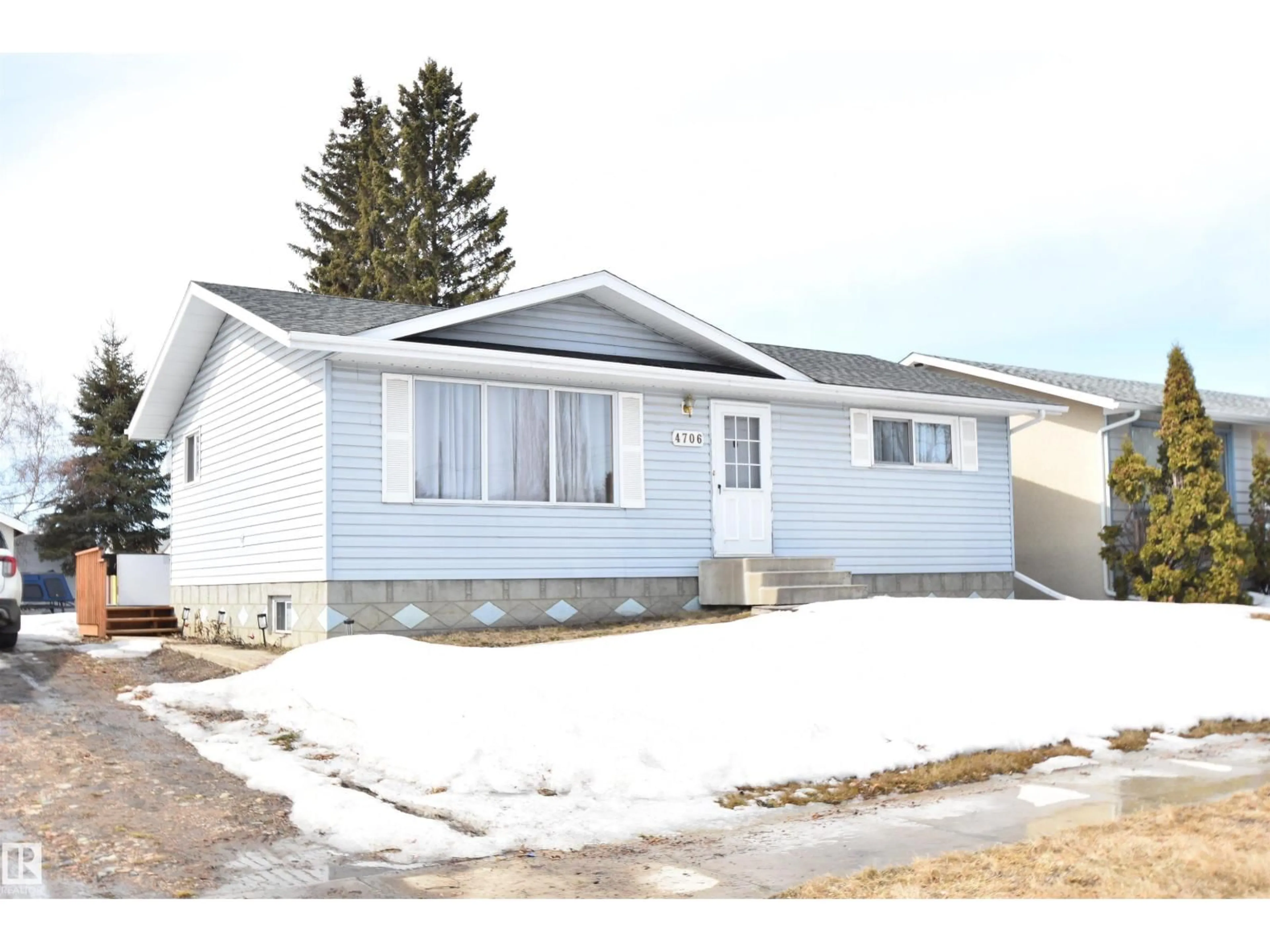 Home with vinyl exterior material, street for 4706 45 ST, St. Paul Town Alberta T0A3A3