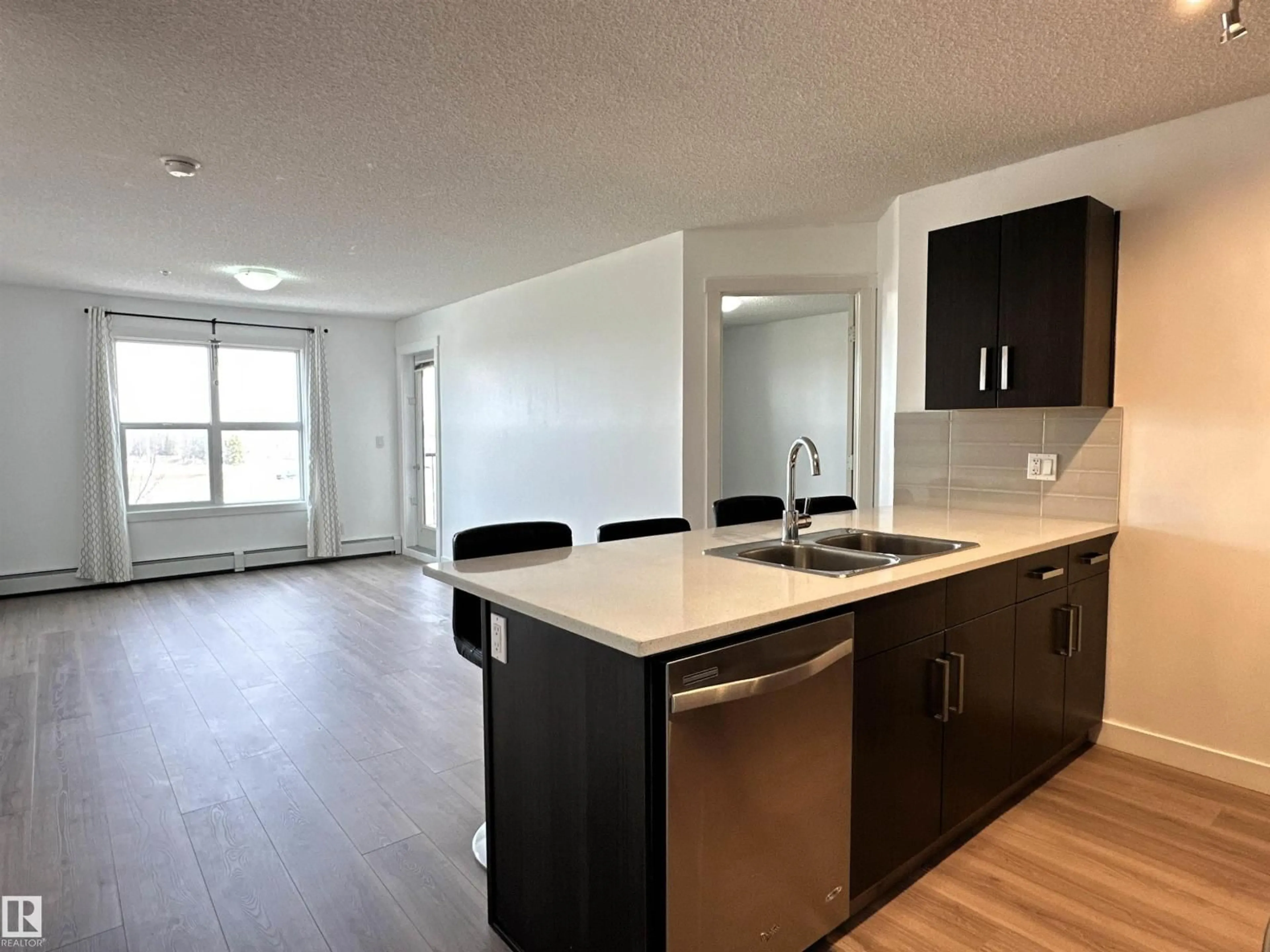 Open concept kitchen, unknown for 667 - 311 WATT BV, Edmonton Alberta T6X0Y2