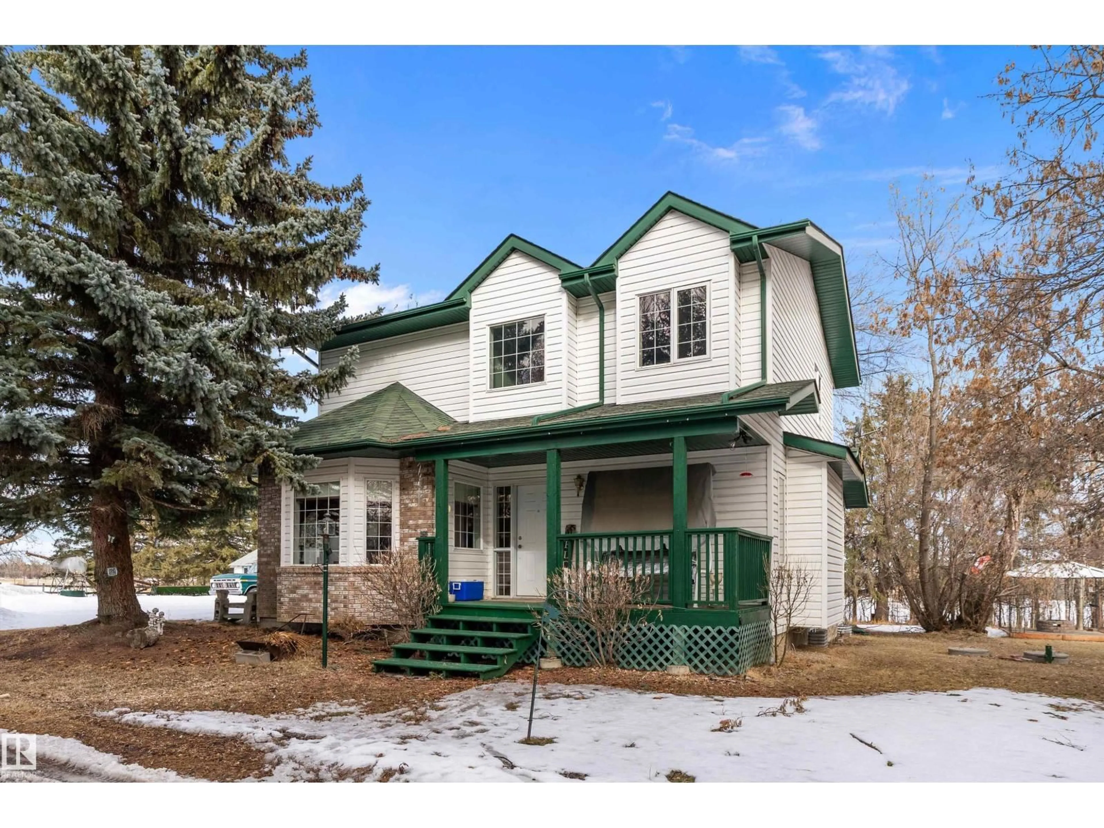 Home with vinyl exterior material, street for 2214A TWP ROAD 534, Rural Lac Ste. Anne County Alberta T0E1V0