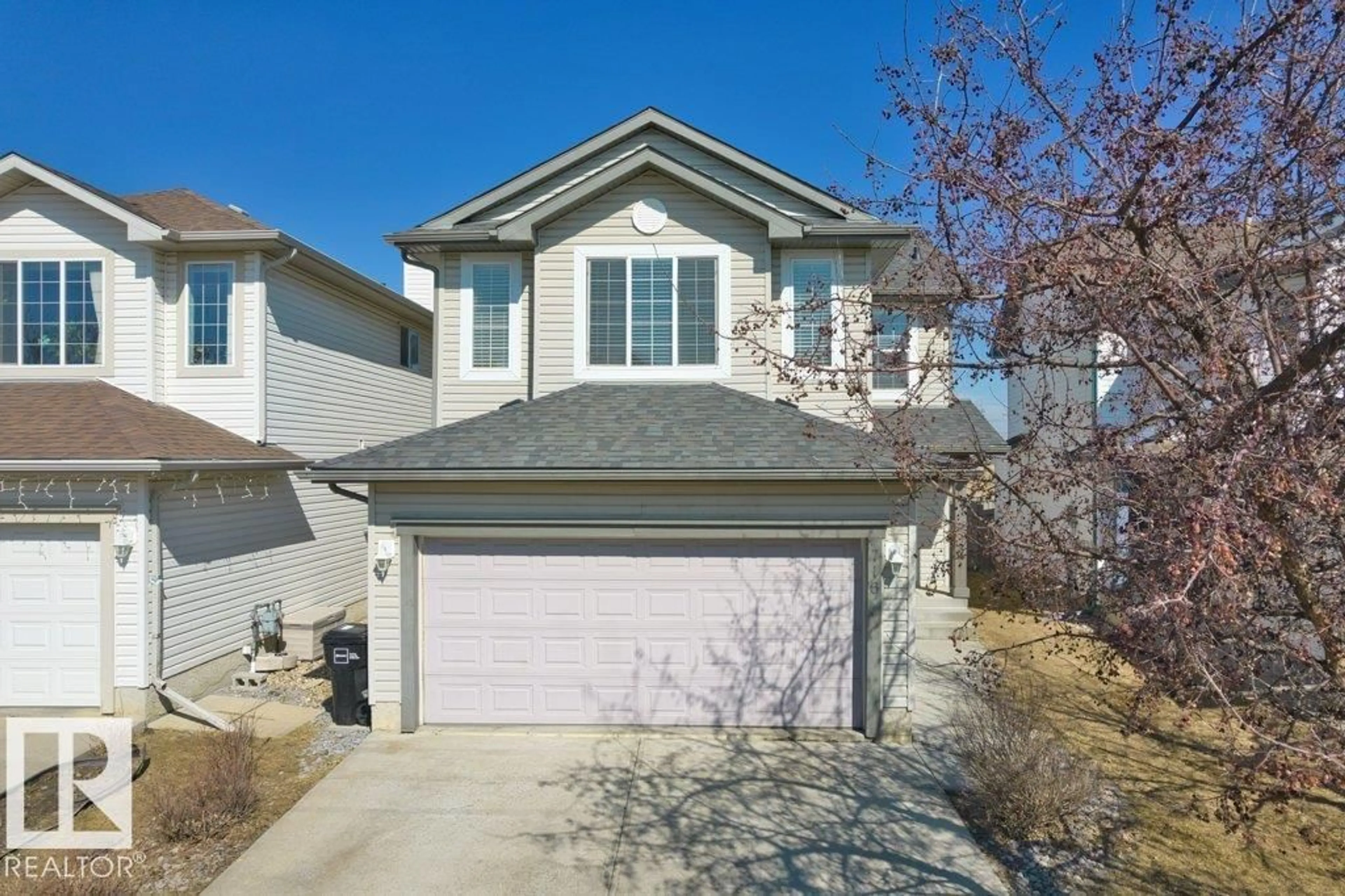 Home with vinyl exterior material, street for SW - 716 MCALLISTER LO, Edmonton Alberta T6W1X8