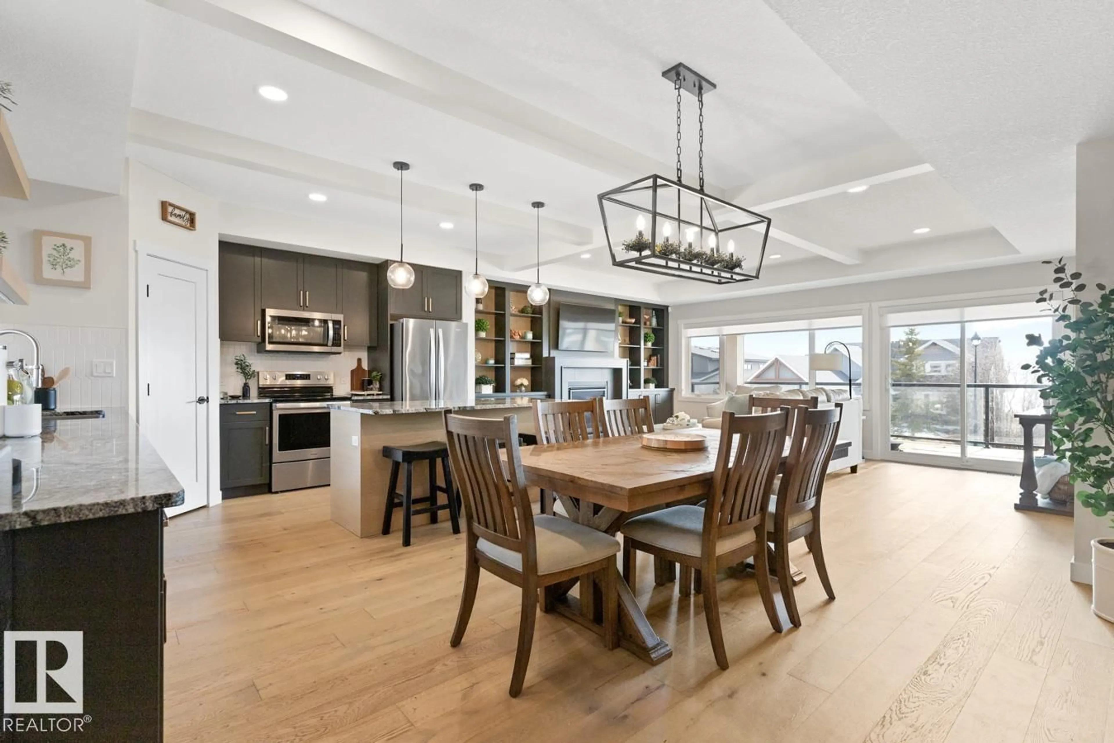 Open concept kitchen, wood/laminate floor for #209 - 55101 STE. ANNE TR, Rural Lac Ste. Anne County Alberta T0E1A1