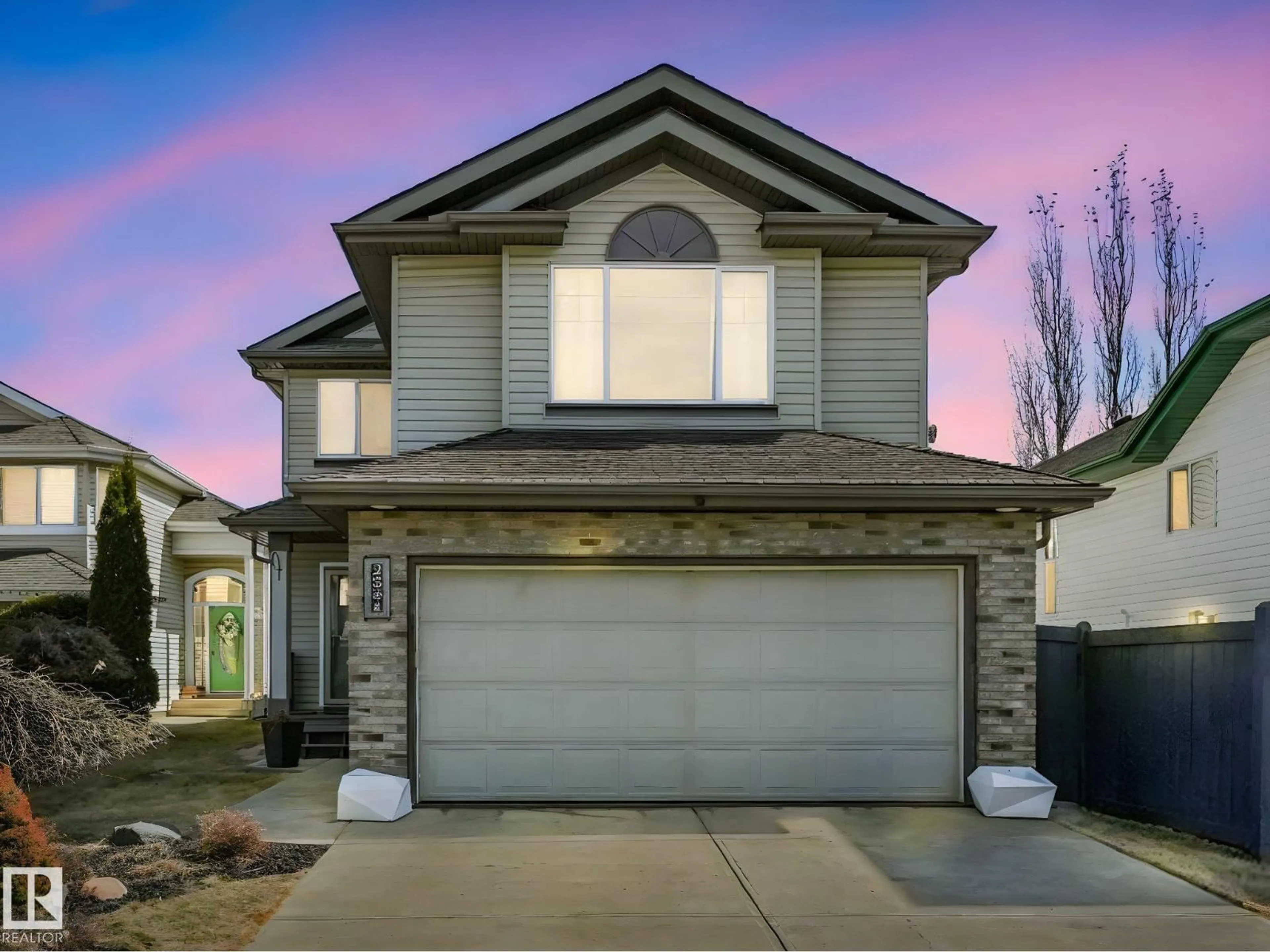 Home with vinyl exterior material, street for 2354 TAYLOR CL, Edmonton Alberta T6R3J8
