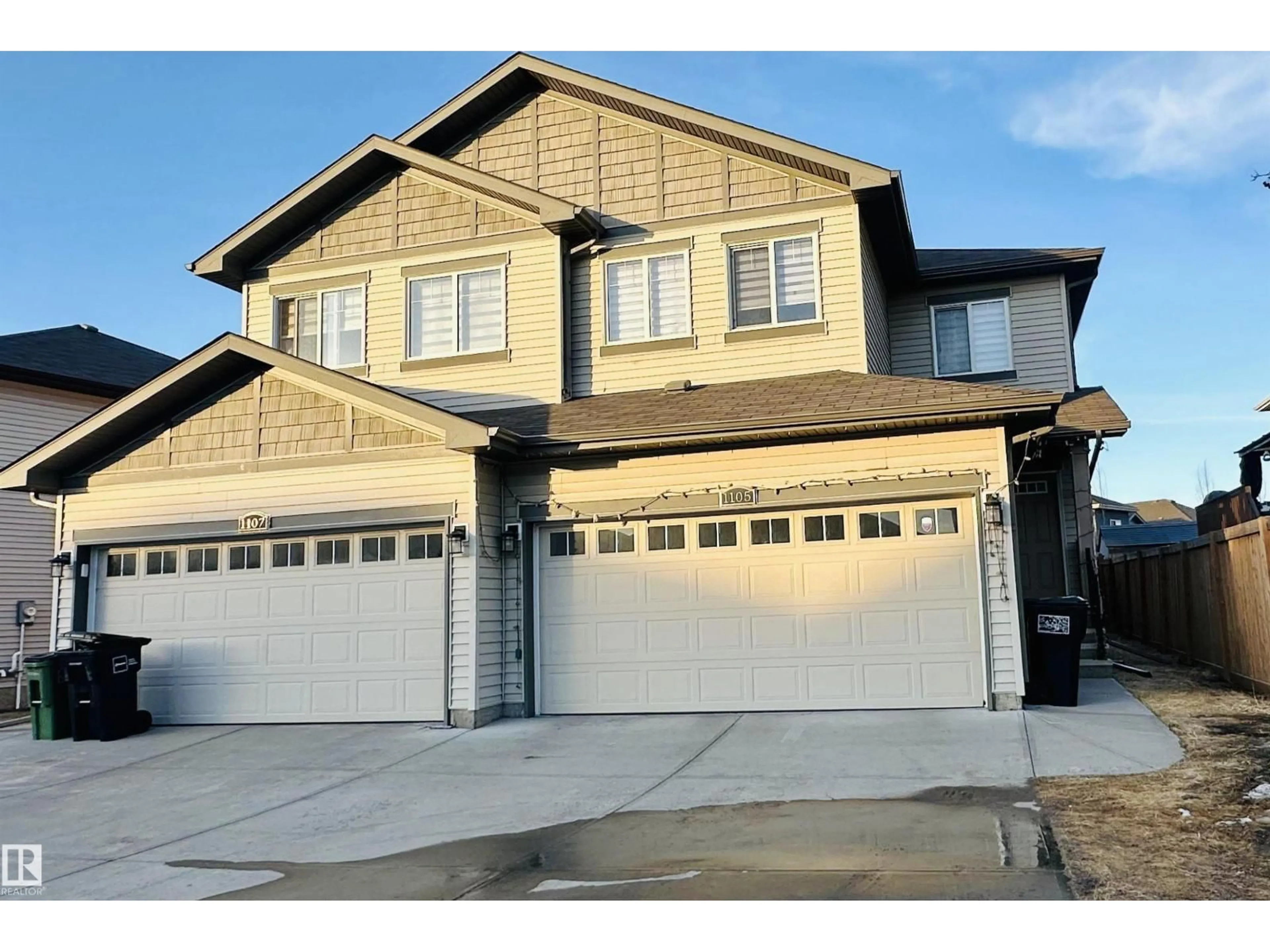 Home with vinyl exterior material, street for 1105 33A ST, Edmonton Alberta T6T2C4