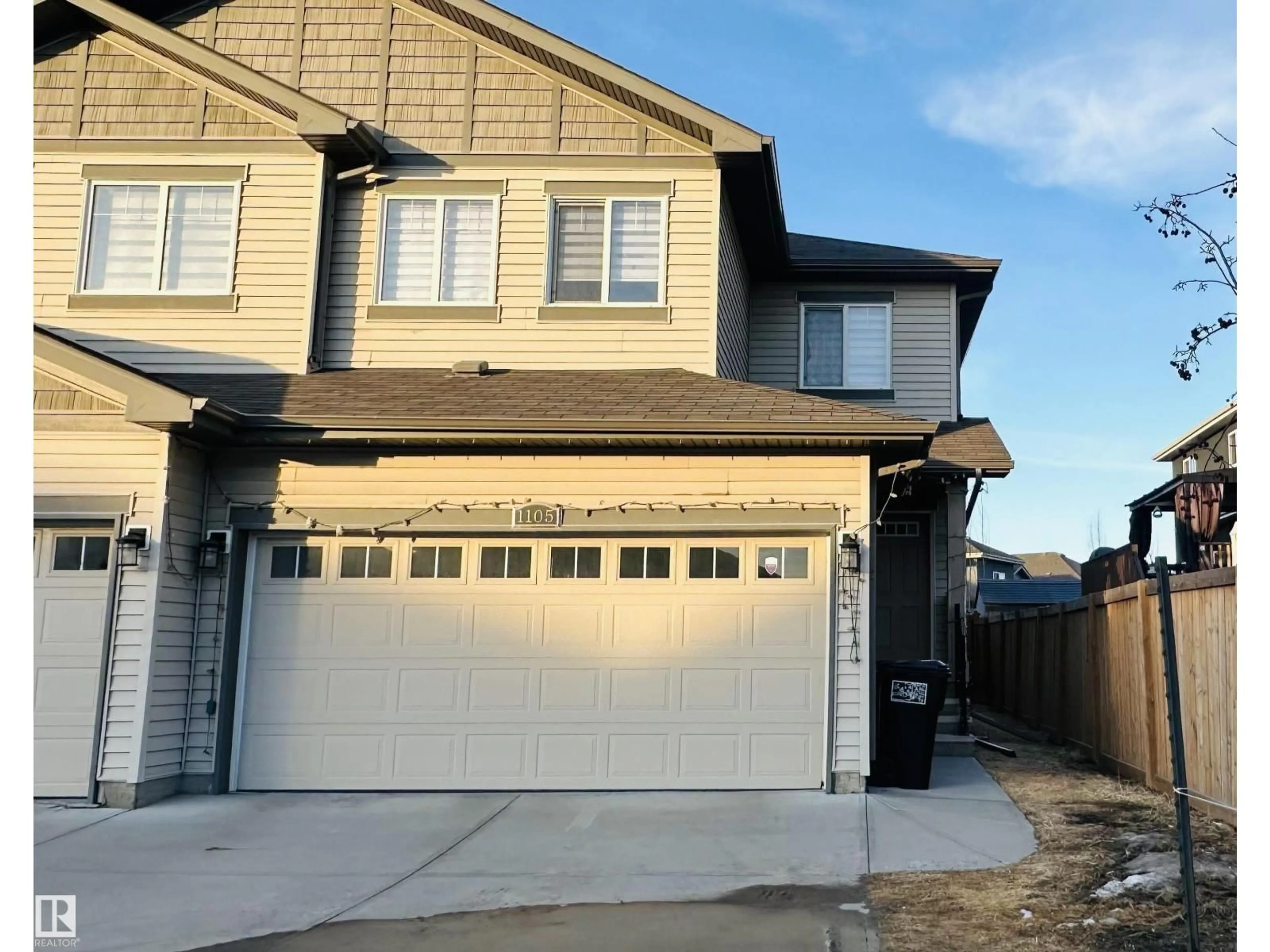Home with vinyl exterior material, street for 1105 33A ST, Edmonton Alberta T6T2C4