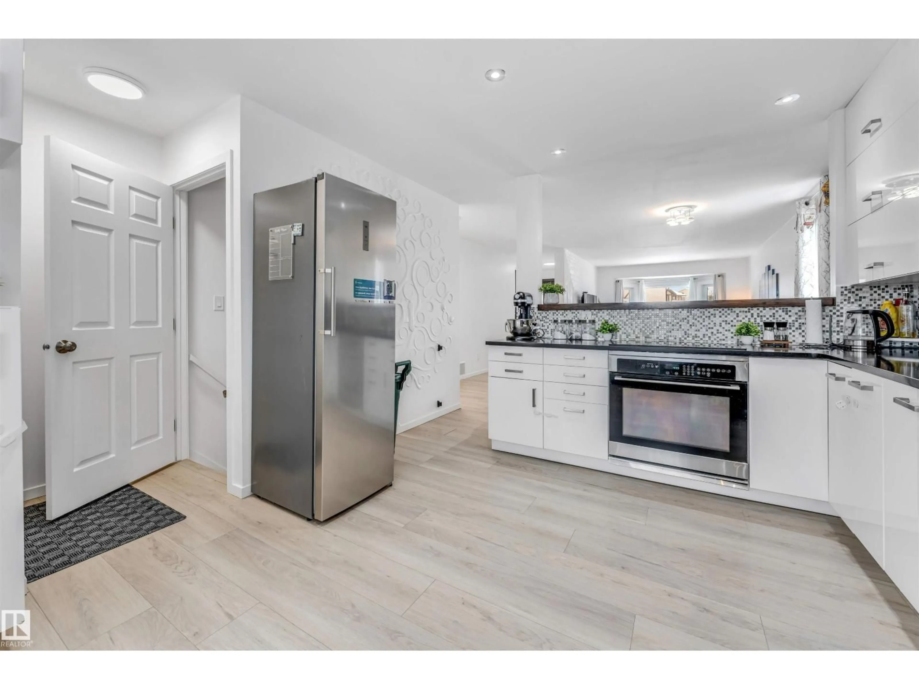 Open concept kitchen, unknown for NW - 18403 55 AV, Edmonton Alberta T6M1Y8