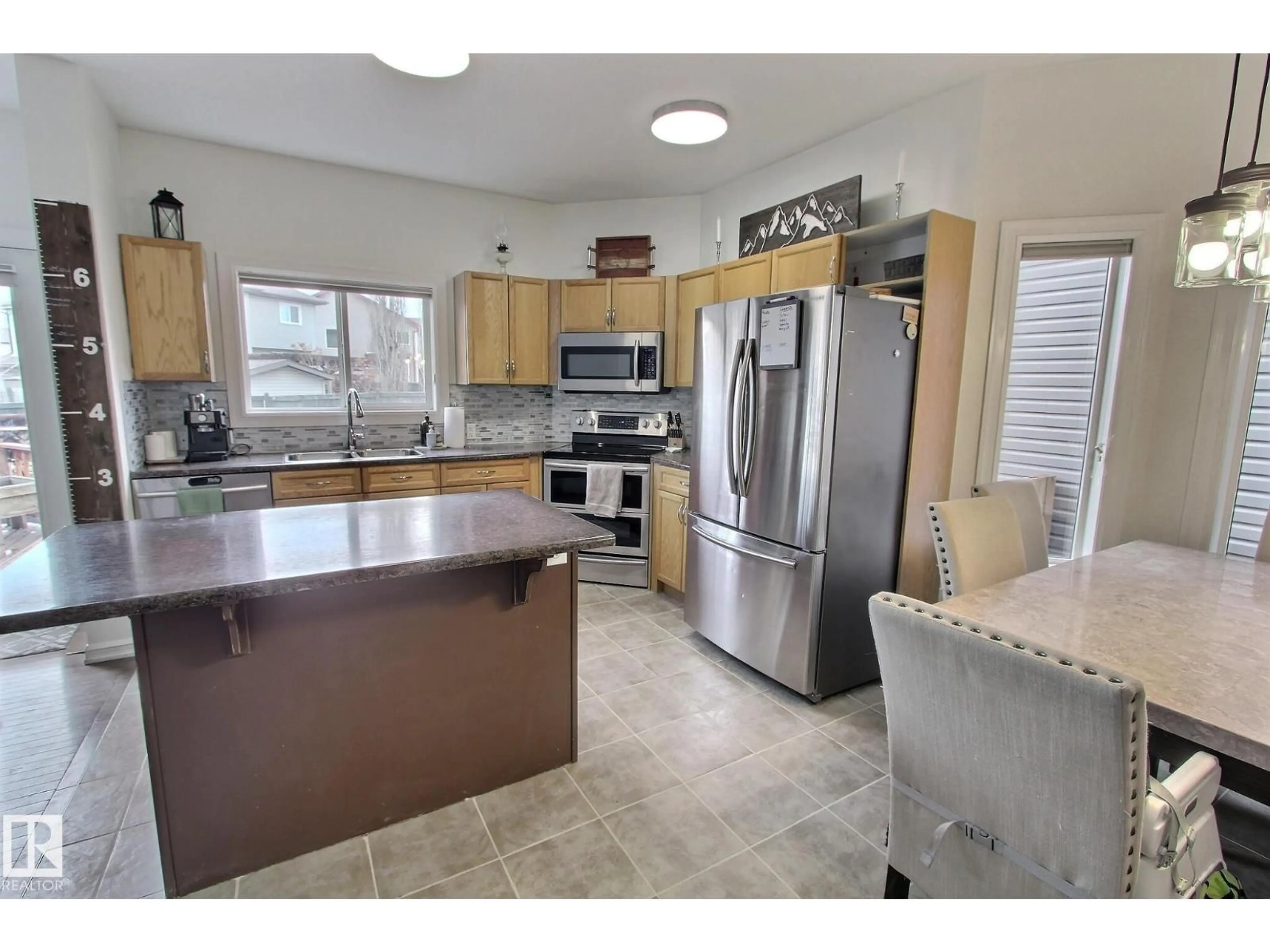 Open concept kitchen, ceramic/tile floor for 38 VERNON ST, Spruce Grove Alberta T7X0B6