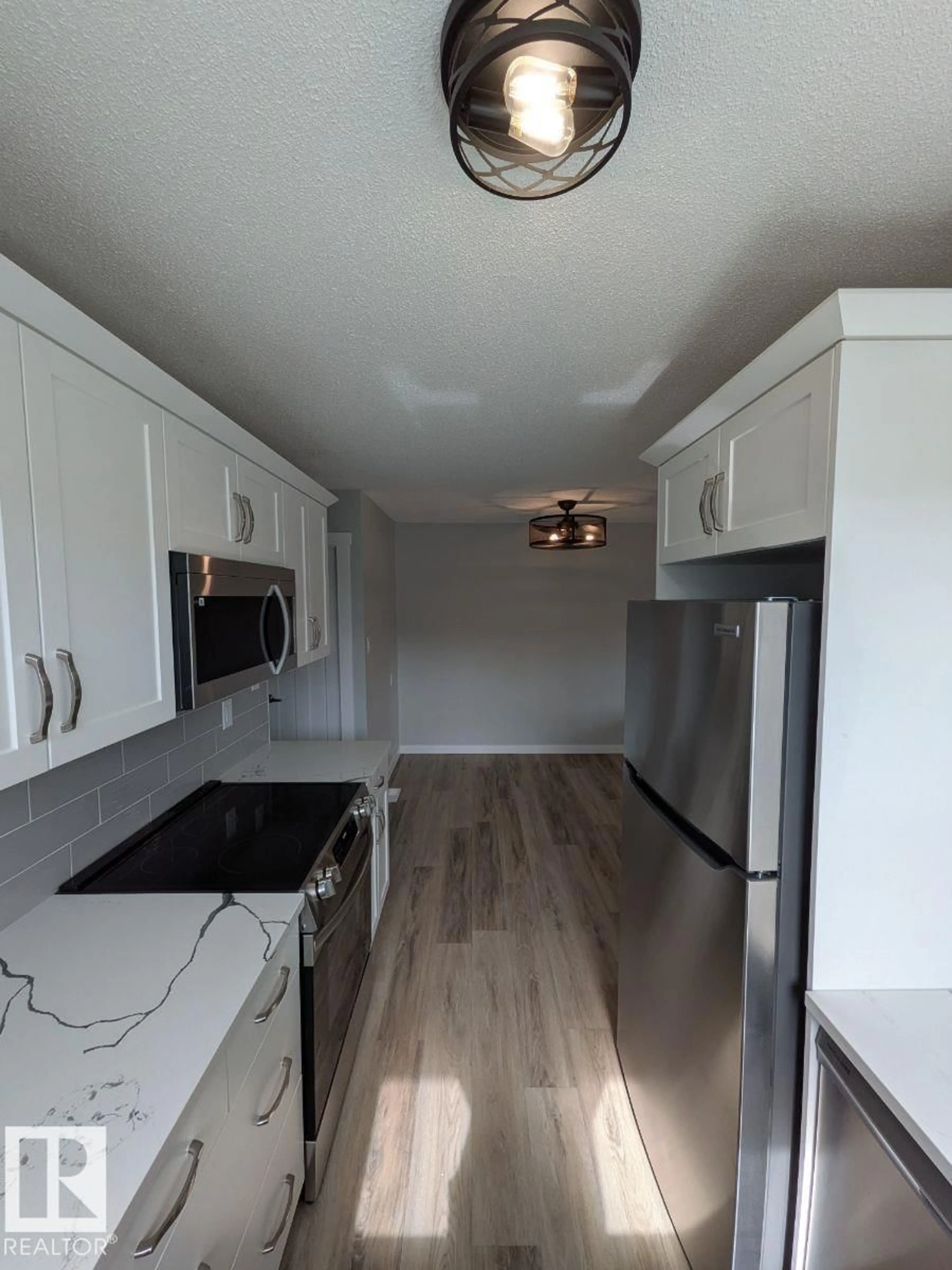 Open concept kitchen, unknown for 68 CAMELOT AV, Leduc Alberta T9E4L7