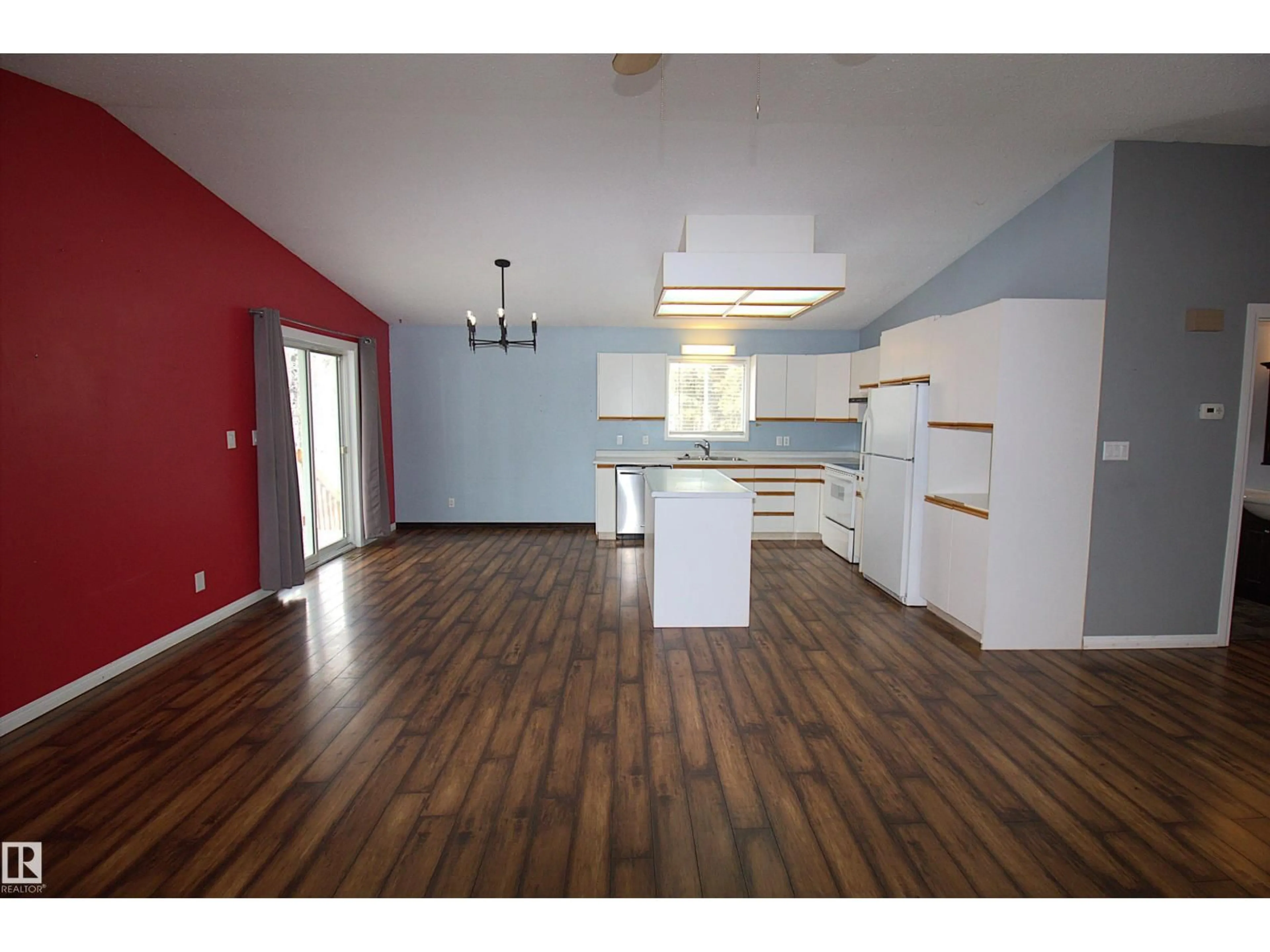 Open concept kitchen, wood/laminate floor for 202 202 - 59412 RNG ROAD 95, Rural St. Paul County Alberta T0A3A0